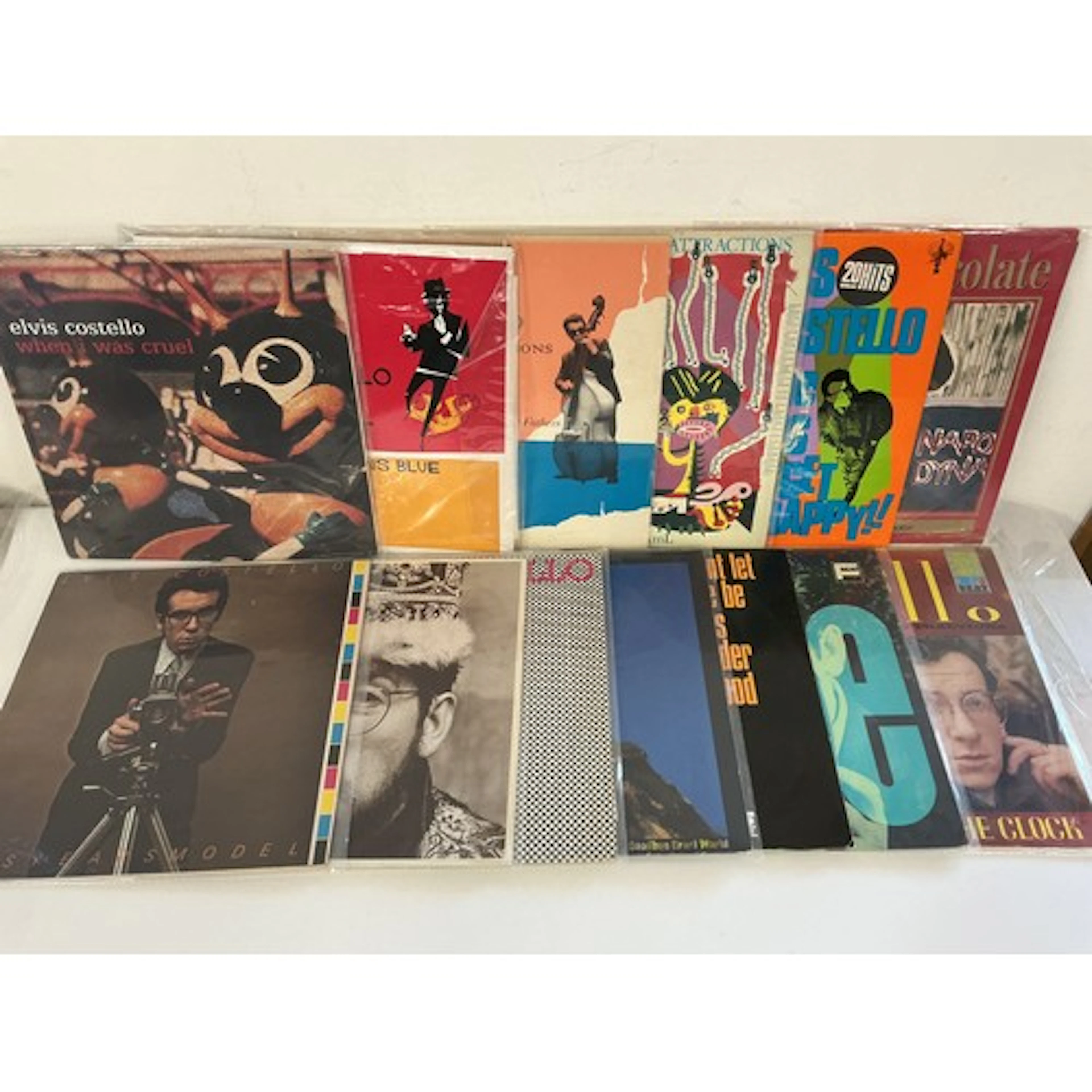 Thirteen Elvis Costello LPs comprising My Flame Burns Blue, ...