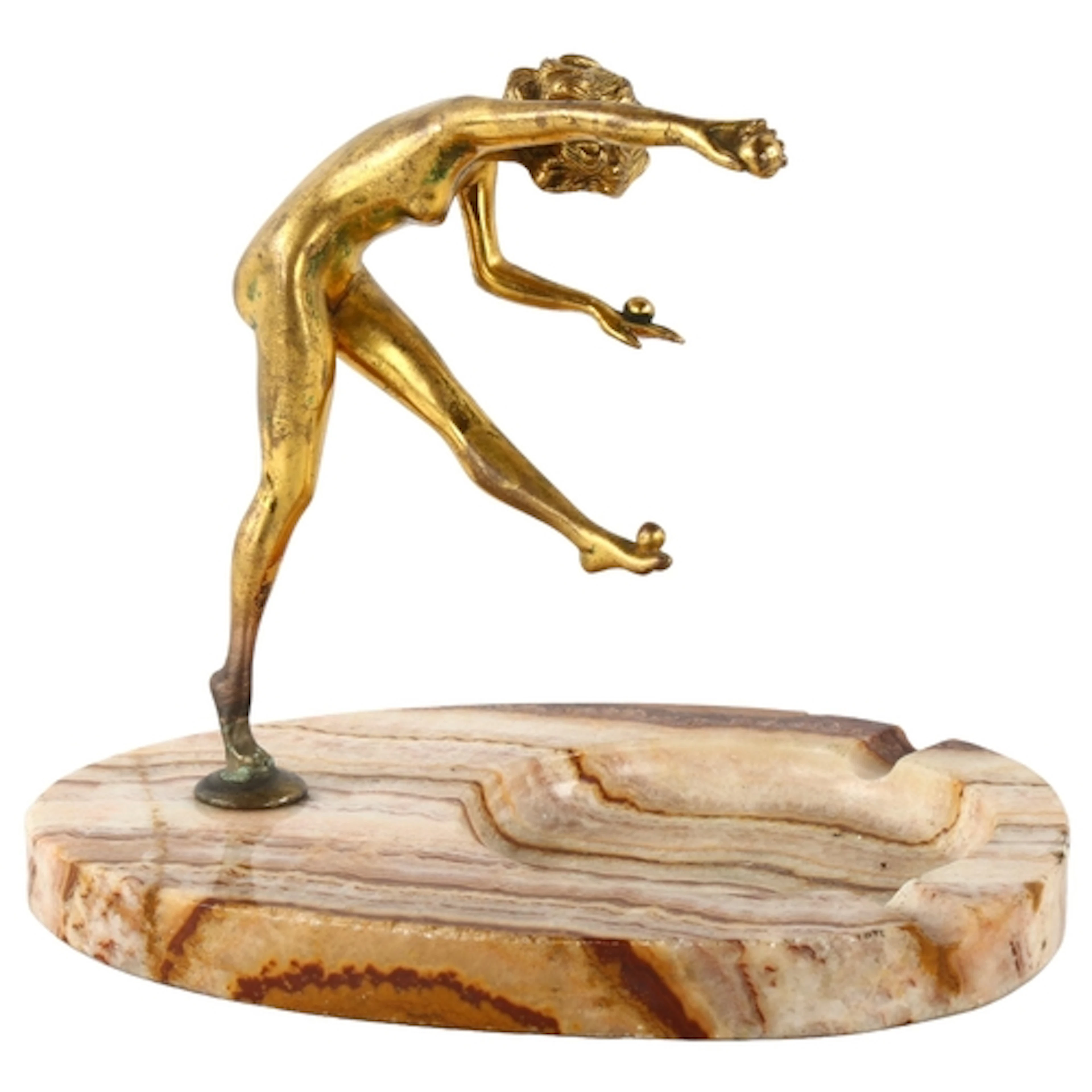 An Art Nouveau gilt-bronze erotic figure of a girl juggling,...
