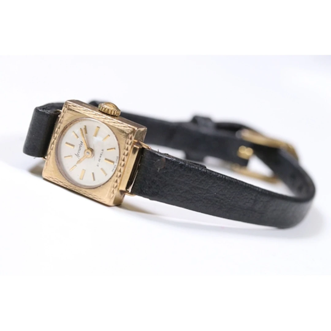 9ct gold Accurist 21 Jewels ladies wrist watch with black le...