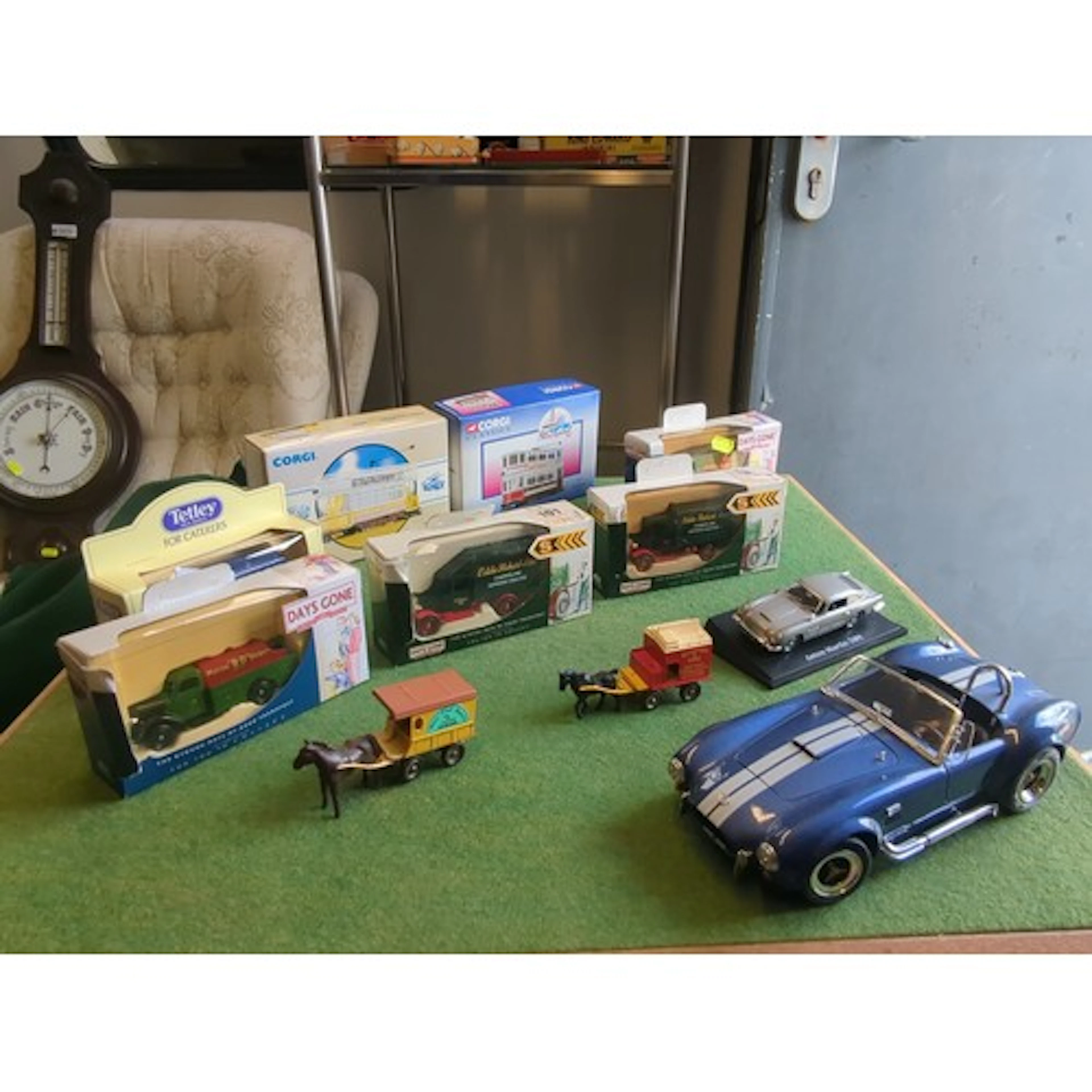 A group of die-cast scale models, largely boxed, including D...