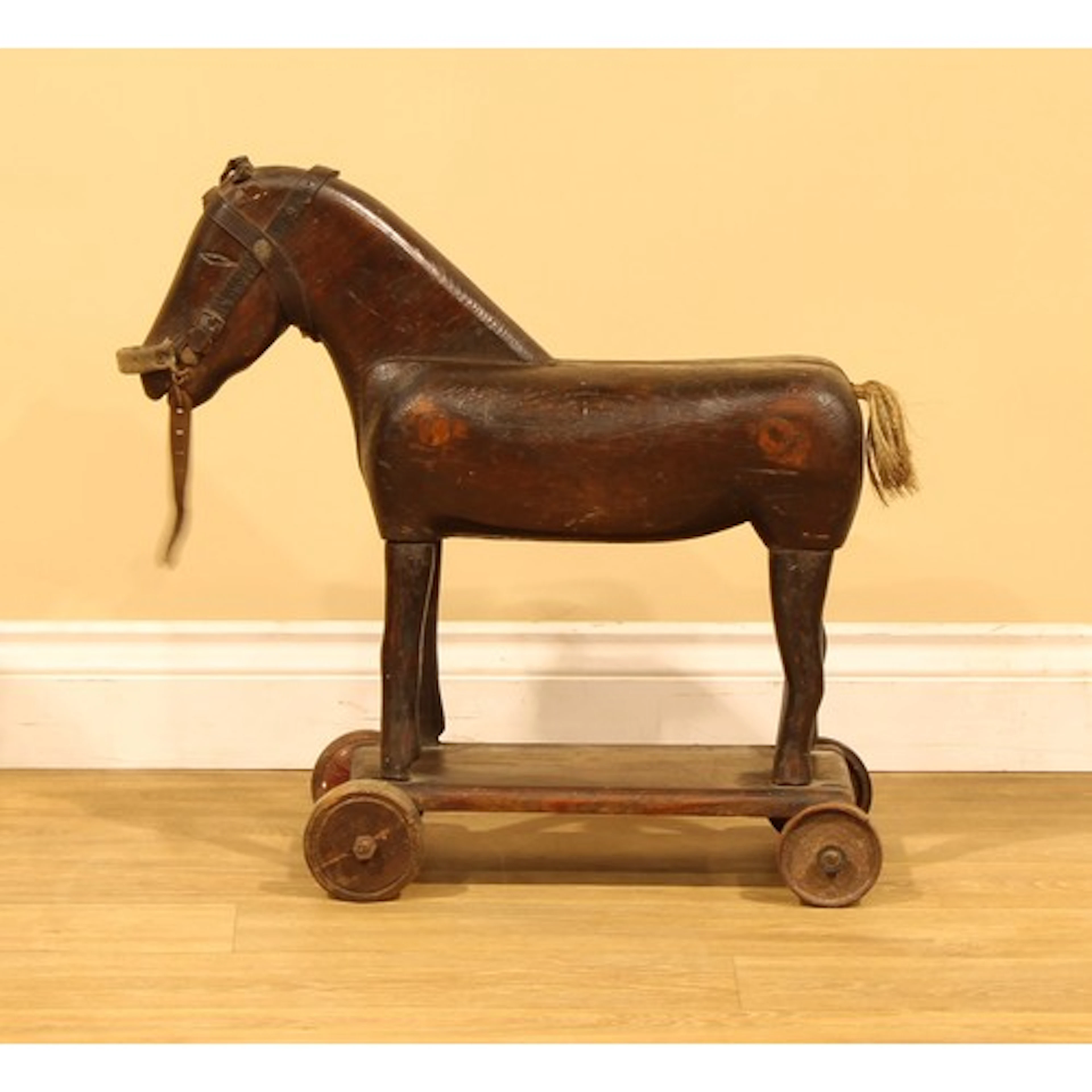 Folk Art - an early 20th century child’s softwood pull-along...