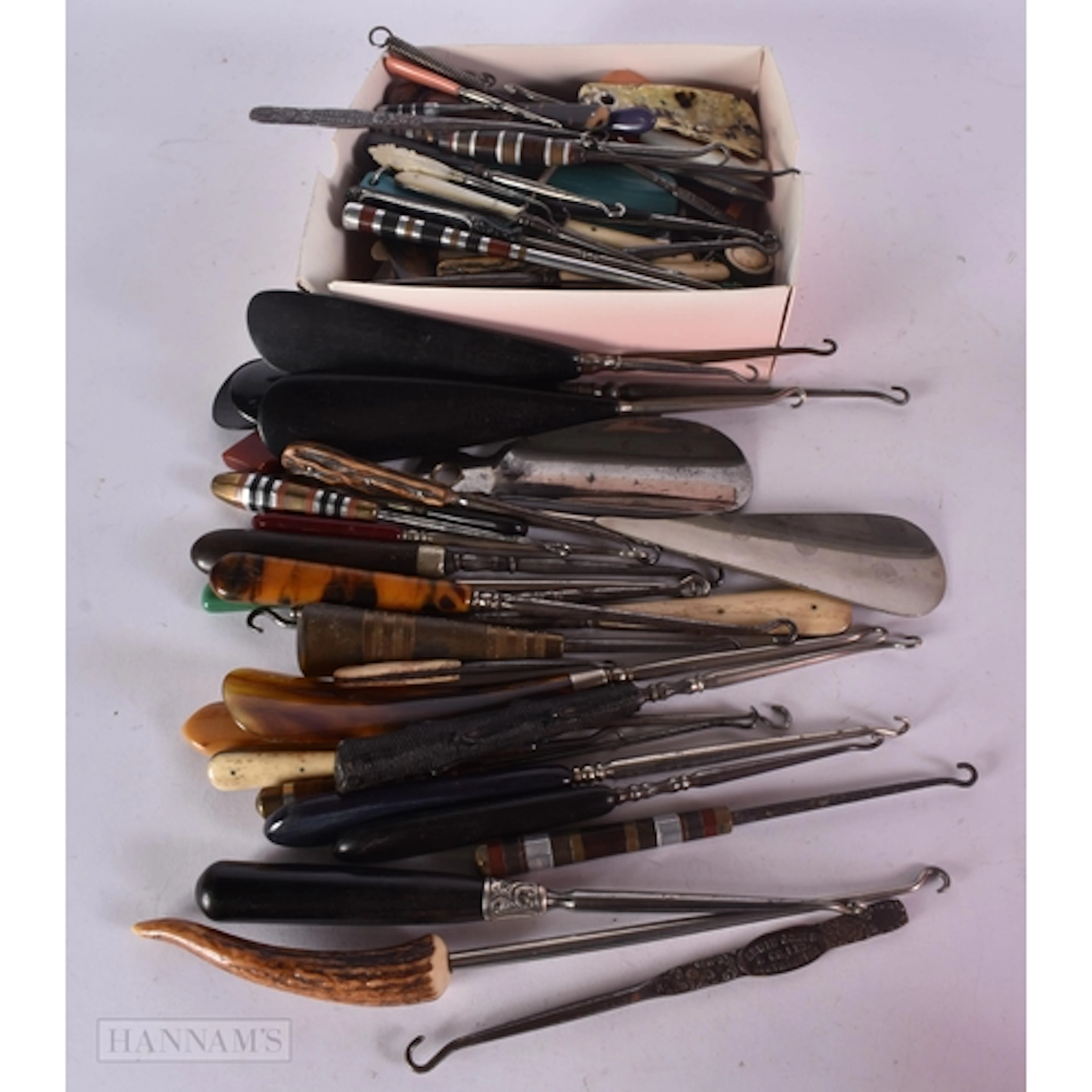 A COLLECTION OF MISC George III & LATER BUTTON HOOKS AND SHO...