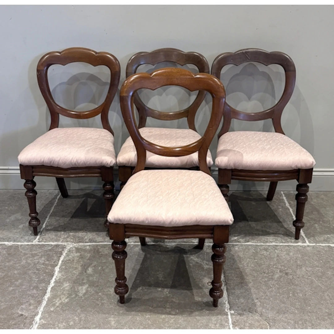 A set of four Victorian mahogany balloon back dining chairs,...