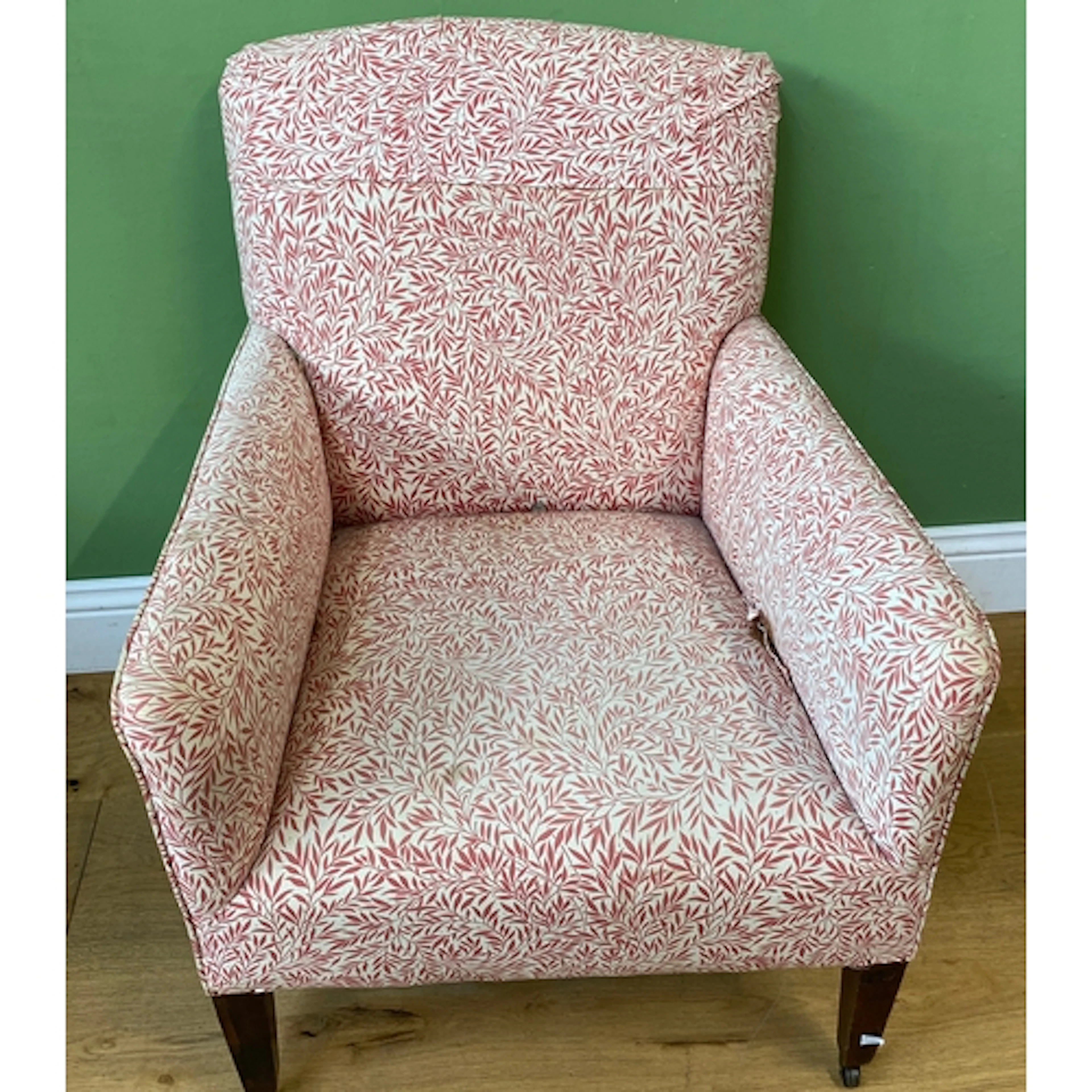 A neat early 20th century armchair in a red William Morris w...