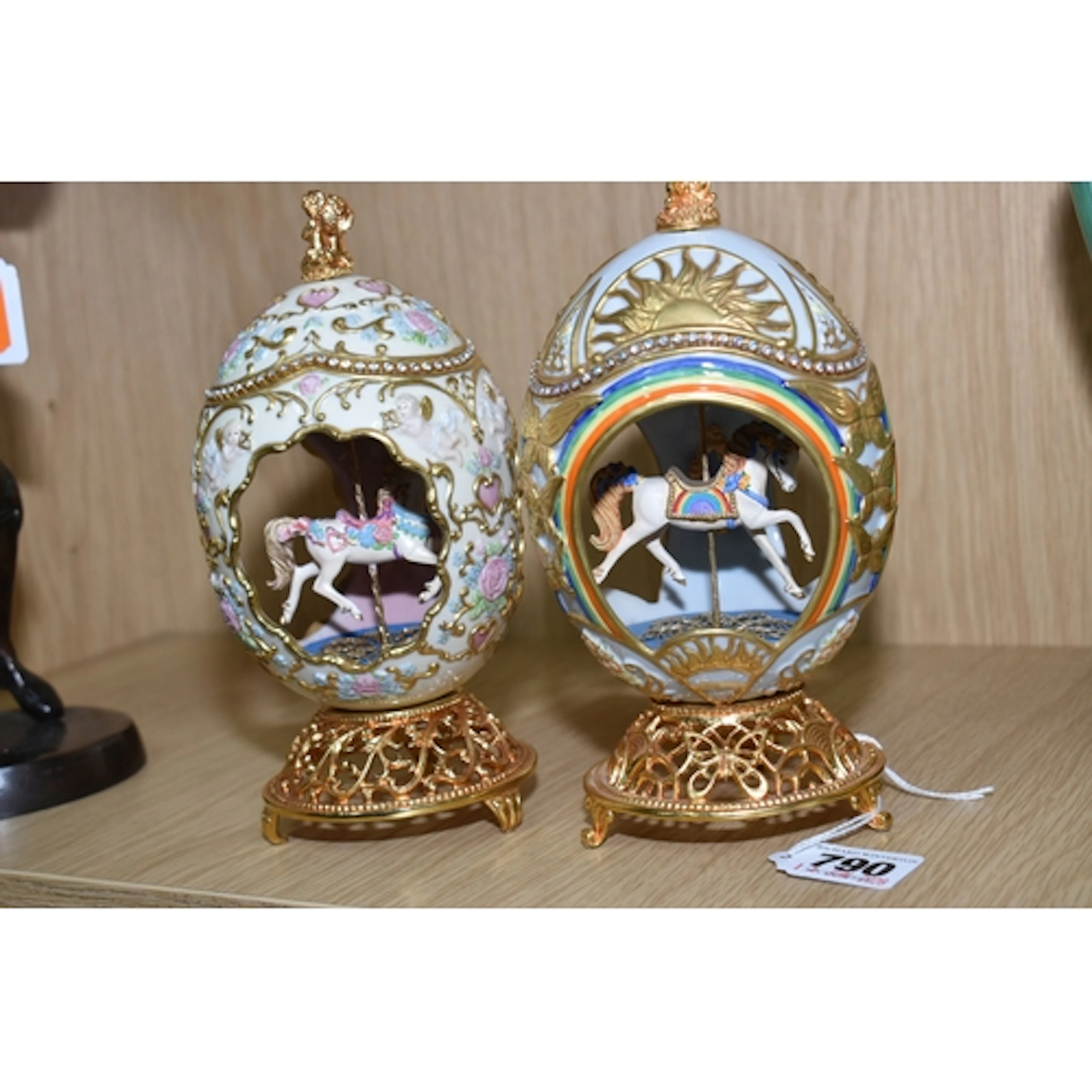 TWO FRANKLIN MINT HOUSE OF FABERGE CAROUSEL EGGS, musical, e...
