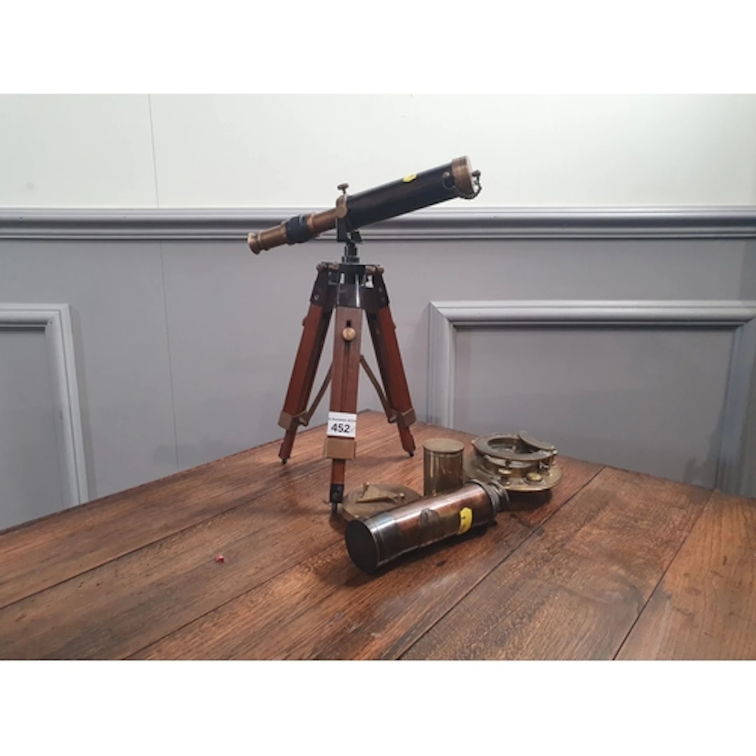 A brass Compass by J.H. Steward Ltd., London, a reproduction...