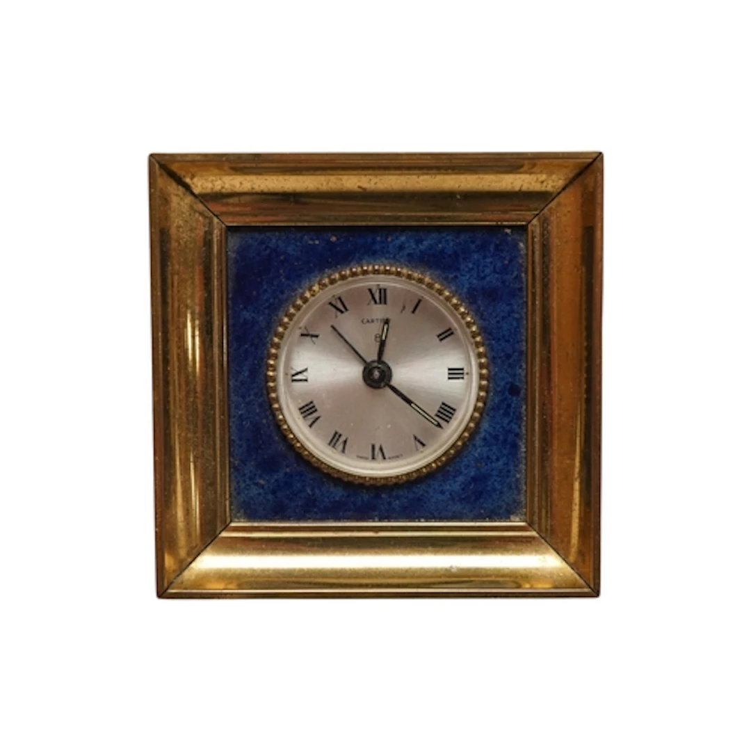 A 1960's Cartier desk timepiece, with a lapis lazuli mount a...