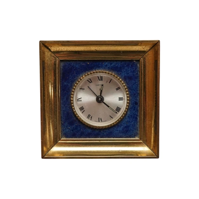 A 1960's Cartier desk timepiece, with a lapis lazuli mount a...