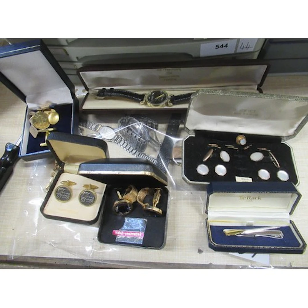 A collection of Wrist Watches together with cufflinks and dr...