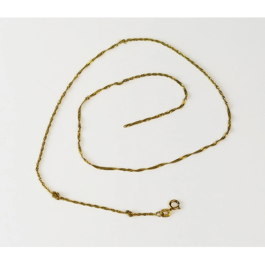 A 9ct yellow gold Singapore link chain, hallmarked, 0.75g. A...