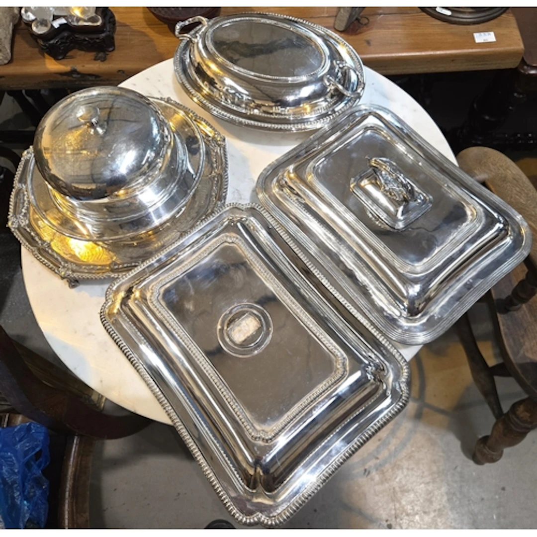 A silver plated muffin dish, silver plated stand and other e...