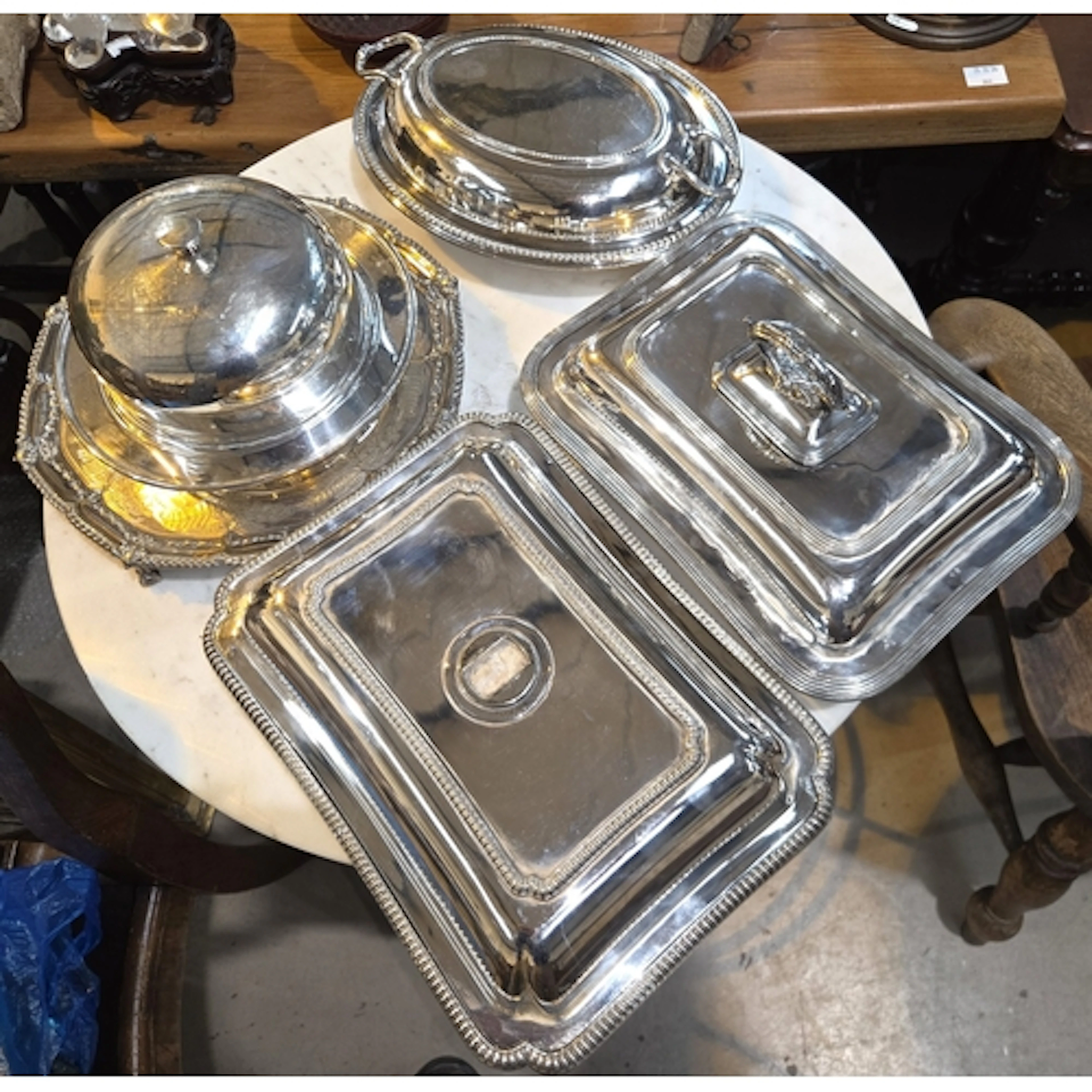 A silver plated muffin dish, silver plated stand and other e...