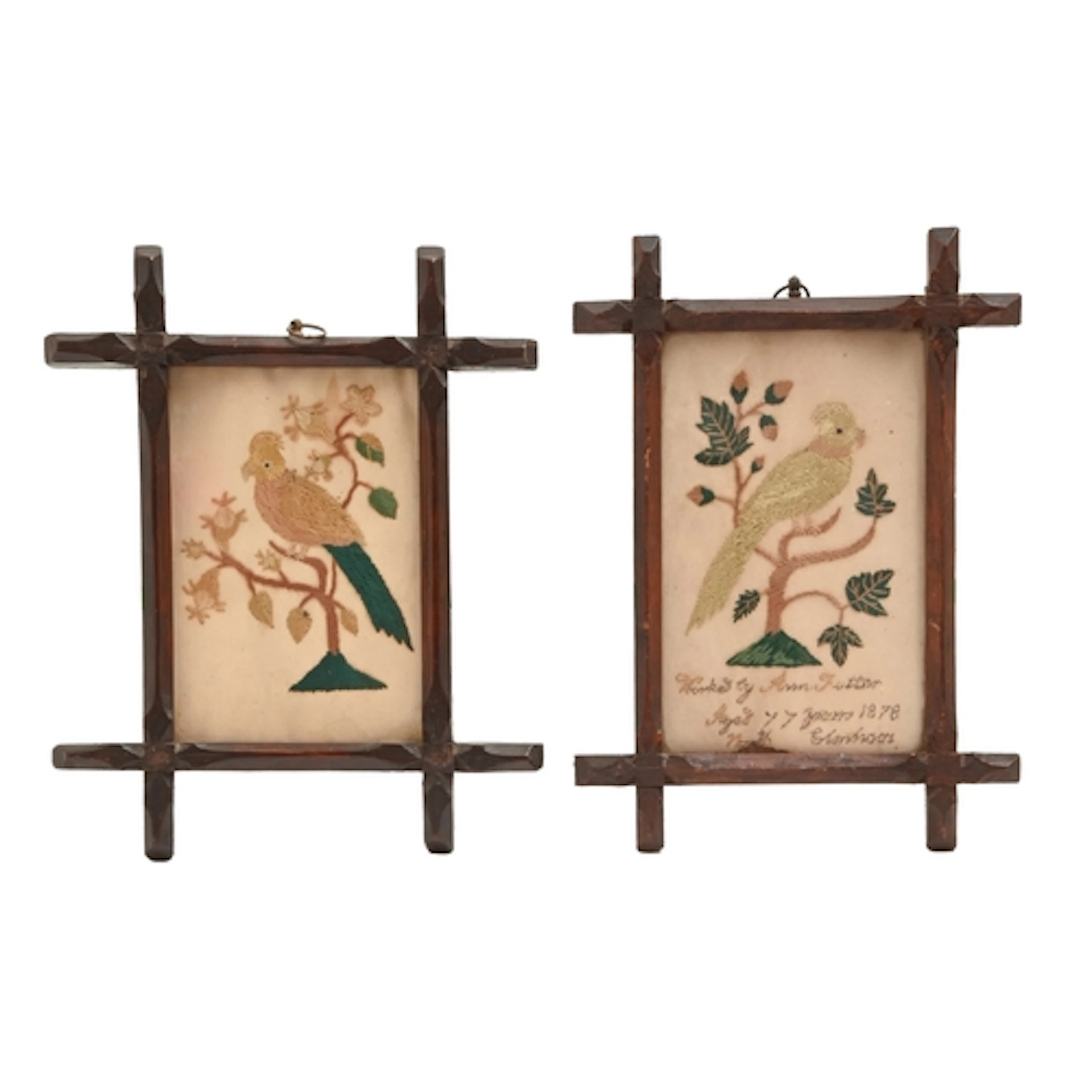 Two Victorian silk pictures of a bird in a tree, one inscrib...