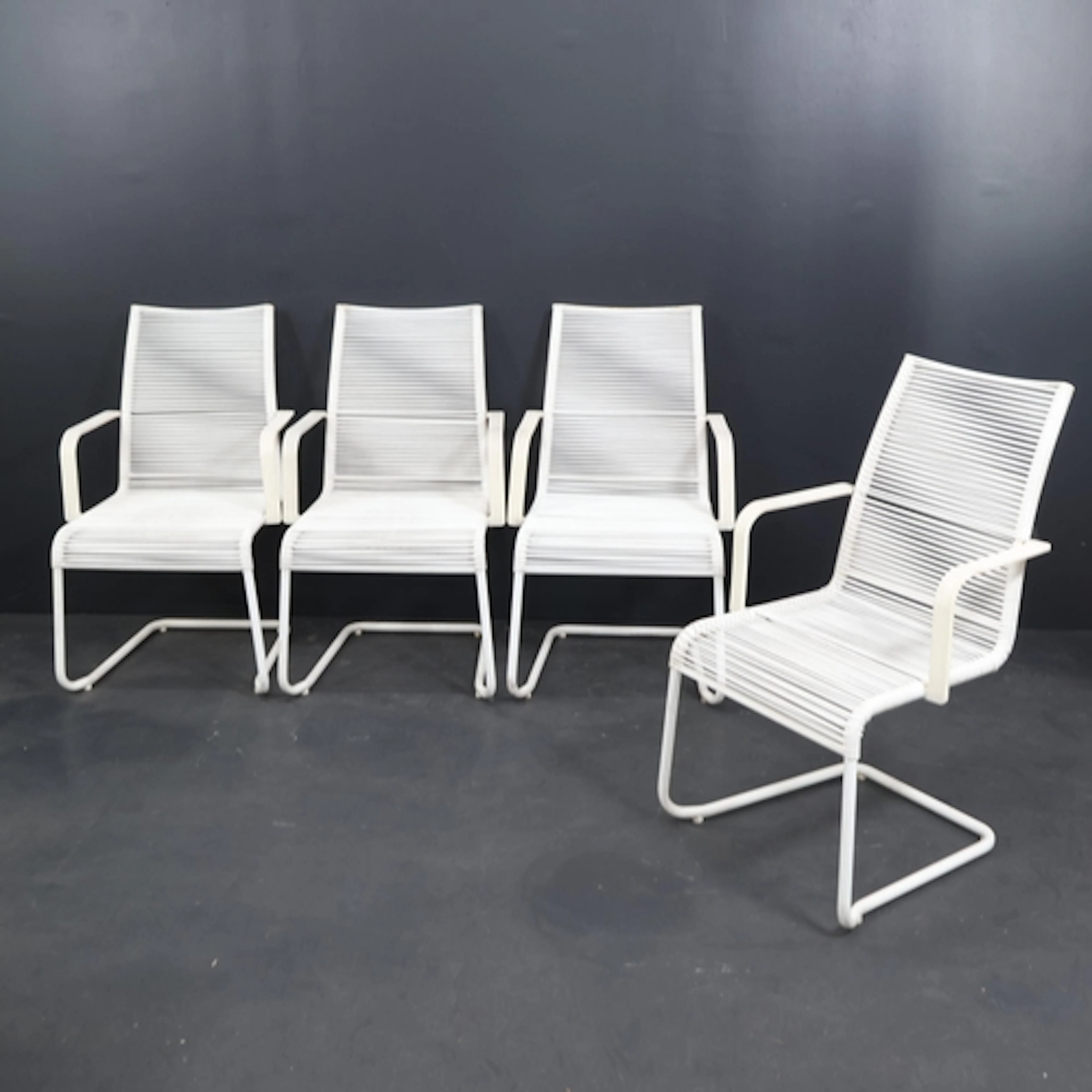 A set of four Vintage Vasman garden chairs by Niels Gammelga...
