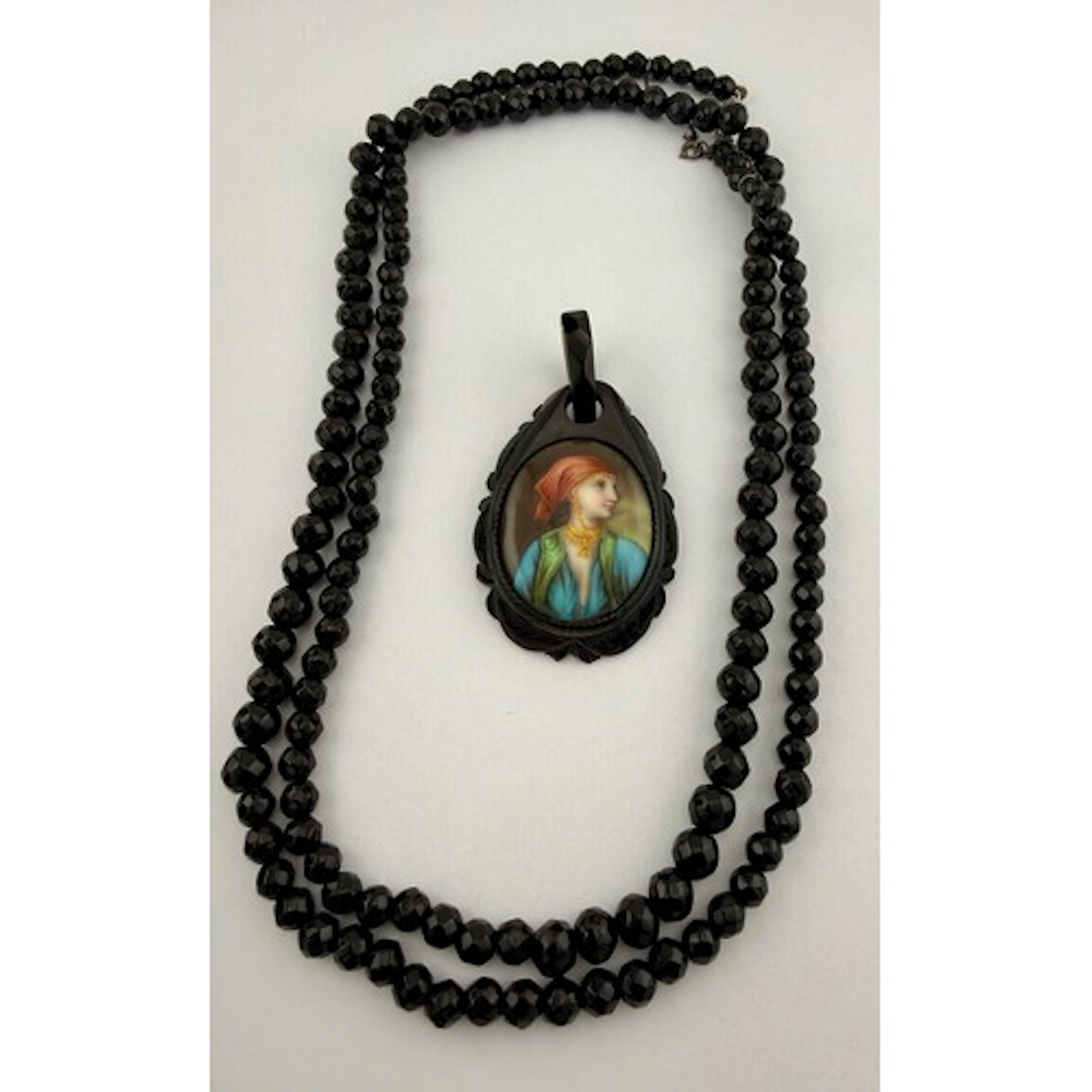 A French jet bead necklace together with Whitby jet pendant ...