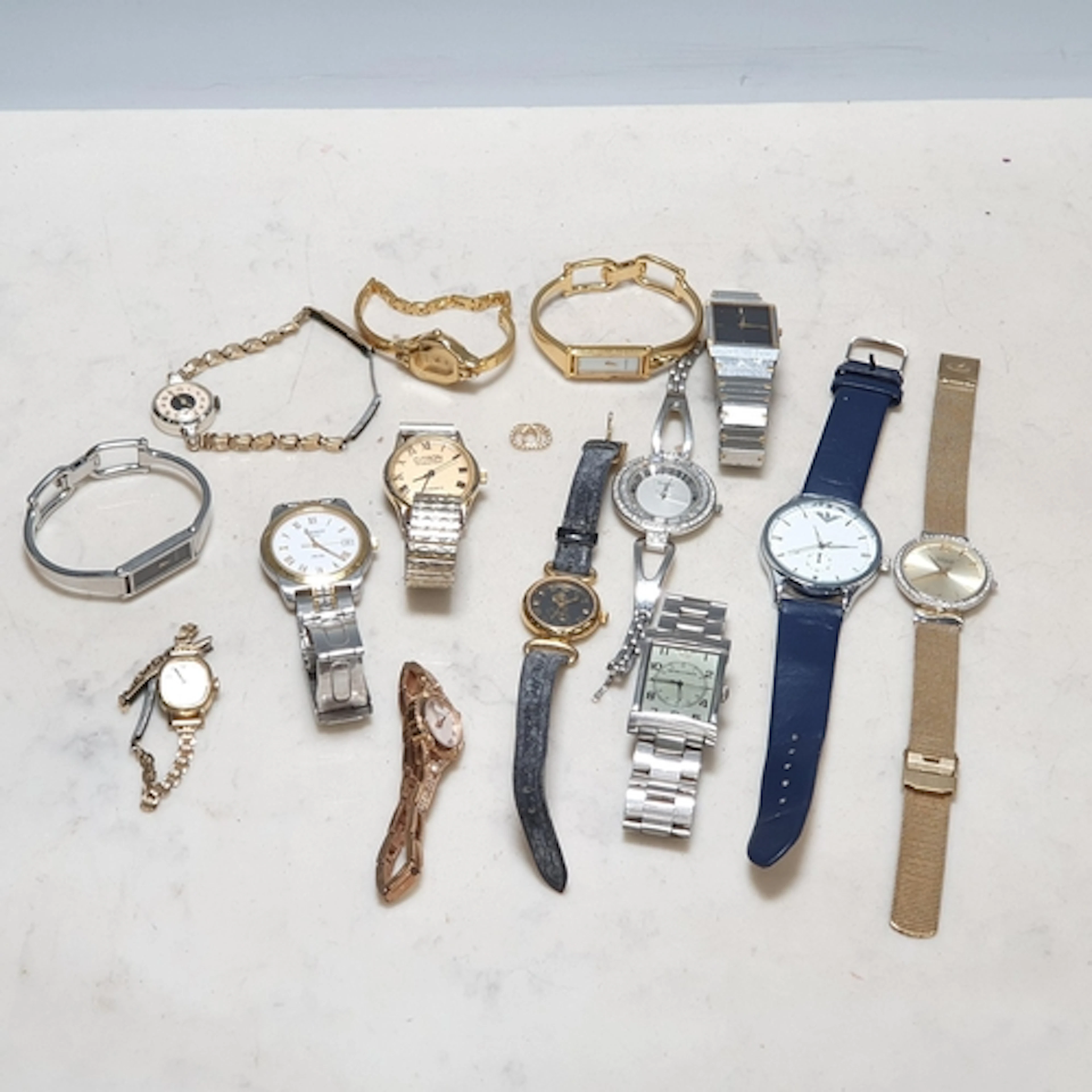 A collection of vintage and modern quartz Wristwatches inclu...