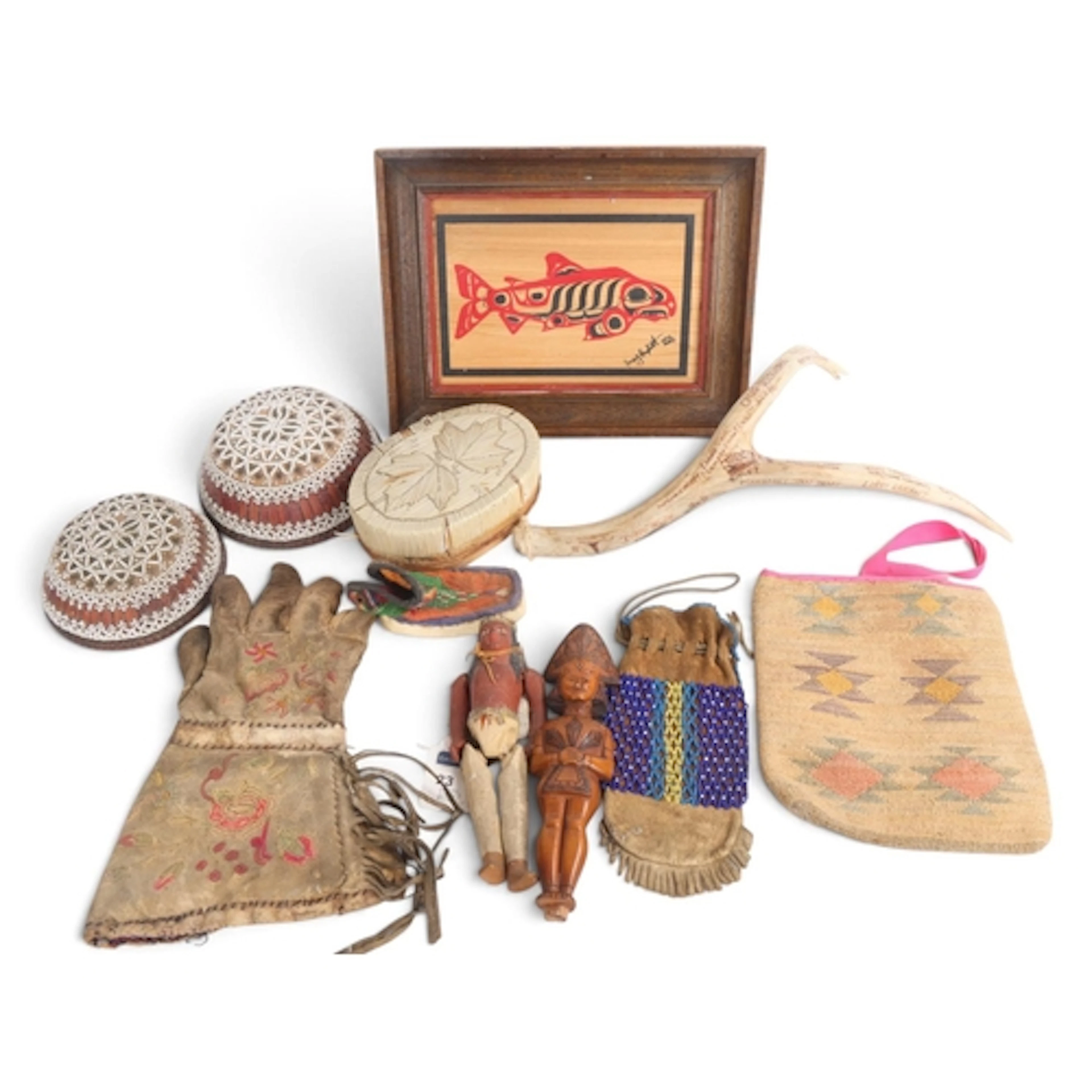 A group of Native American artefacts, including a Plains bea...