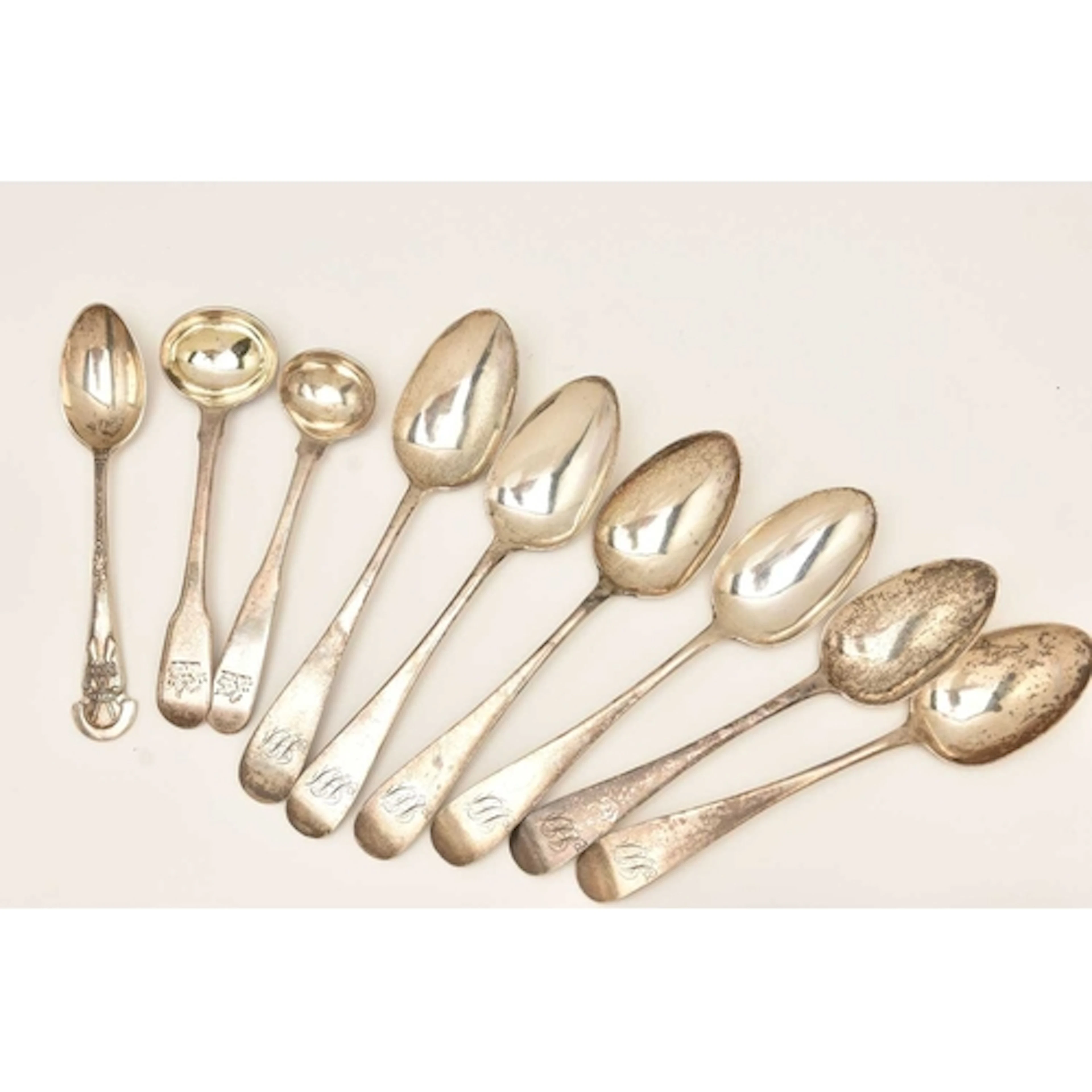 AN ASSORTMENT OF SILVER SPOONS, to include two condiment spo...