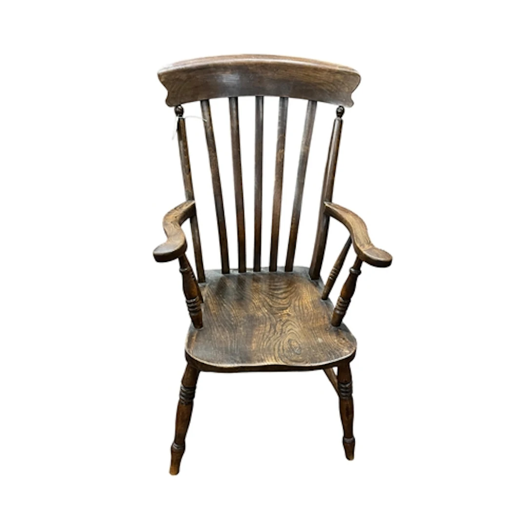A late Victorian elm and beech Windsor lathe back armchair, ...