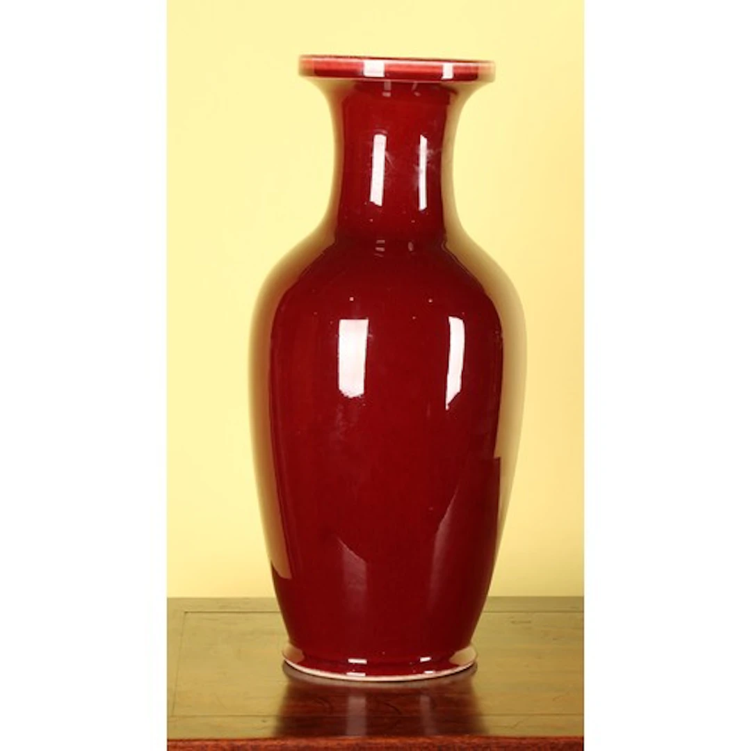 A large Chinese monochrome ovoid vase, Sang de Boeuf glaze, ...