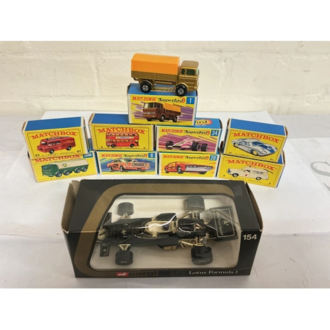9 Boxed Matchbox Diecast And A Corgi Lotus F1 Car.