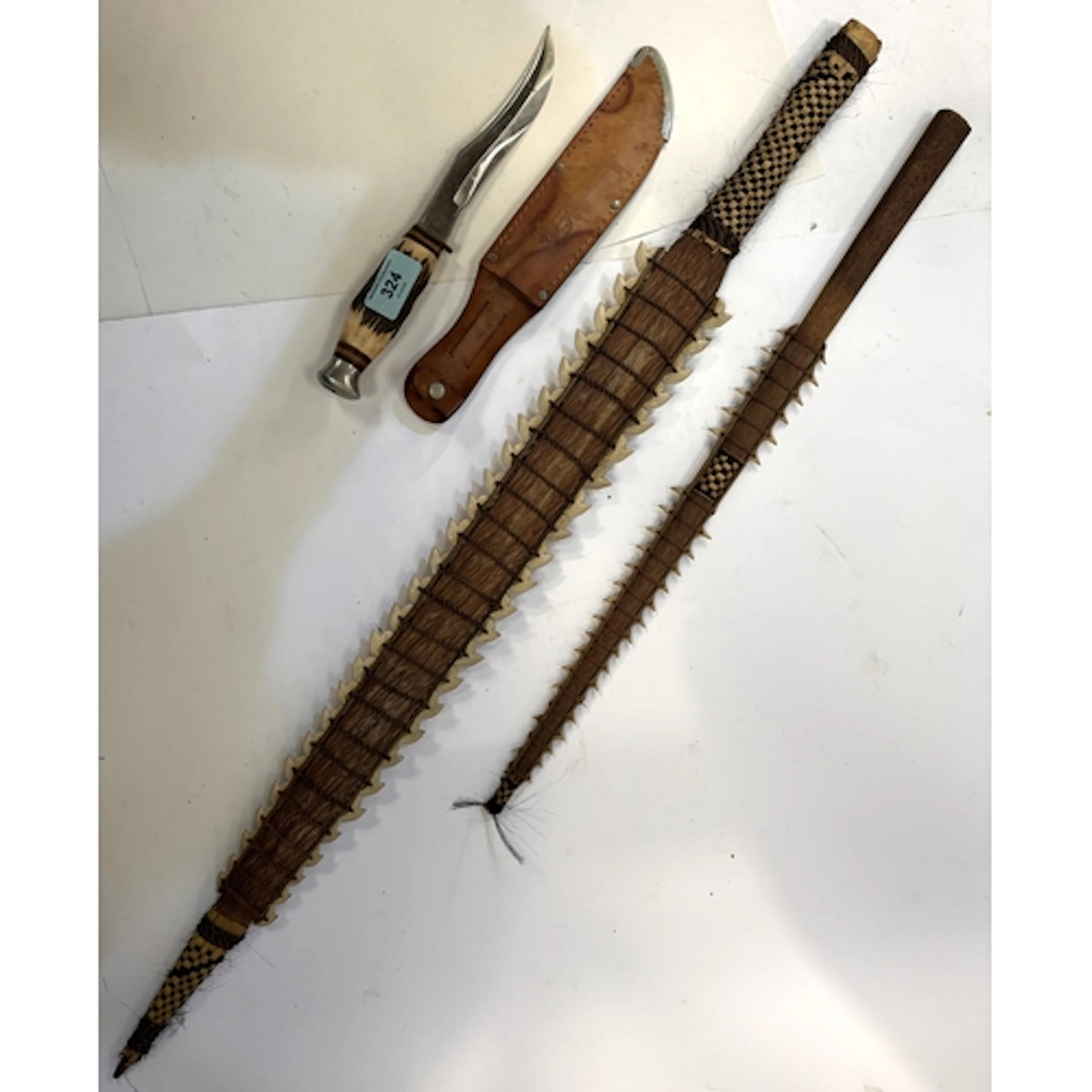A vintage German hunting knife Hirschkrone Solingen with lea...