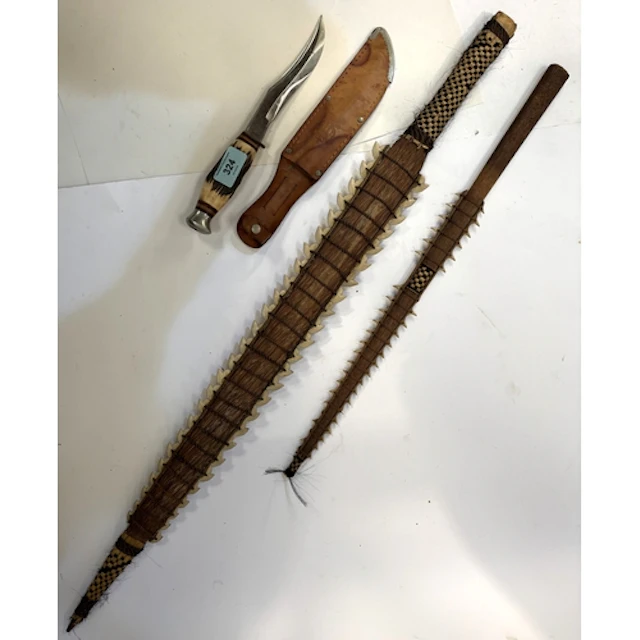 A vintage German hunting knife Hirschkrone Solingen with lea...