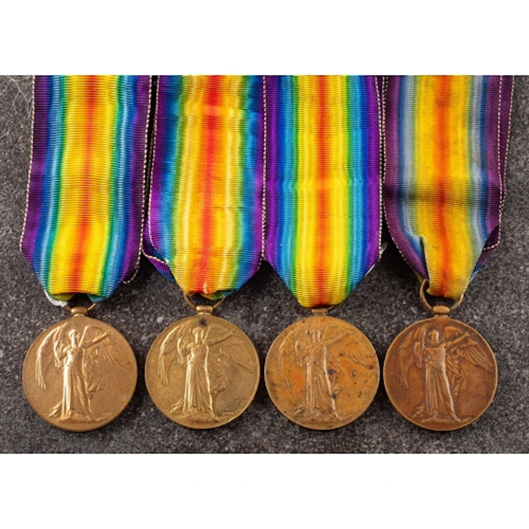 Four George V Victory Medals. '36029 Pte A L Longbottom Bor...