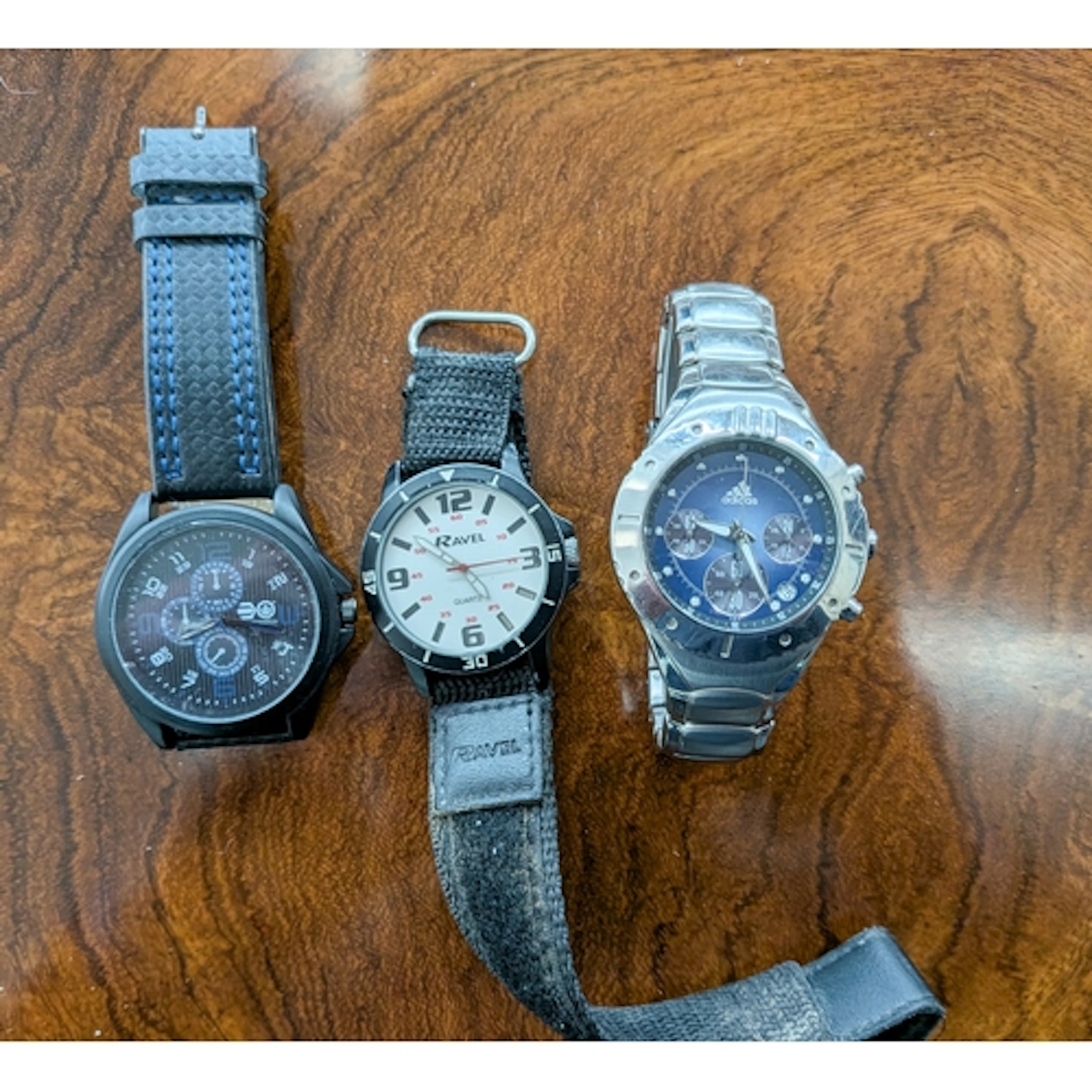 Three modern gent's dress watches to include Ravel, Adidas a...