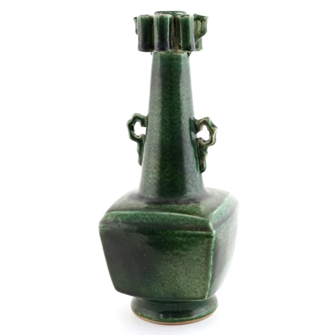 Chinese green glazed porcelain multi candle holder having a ...