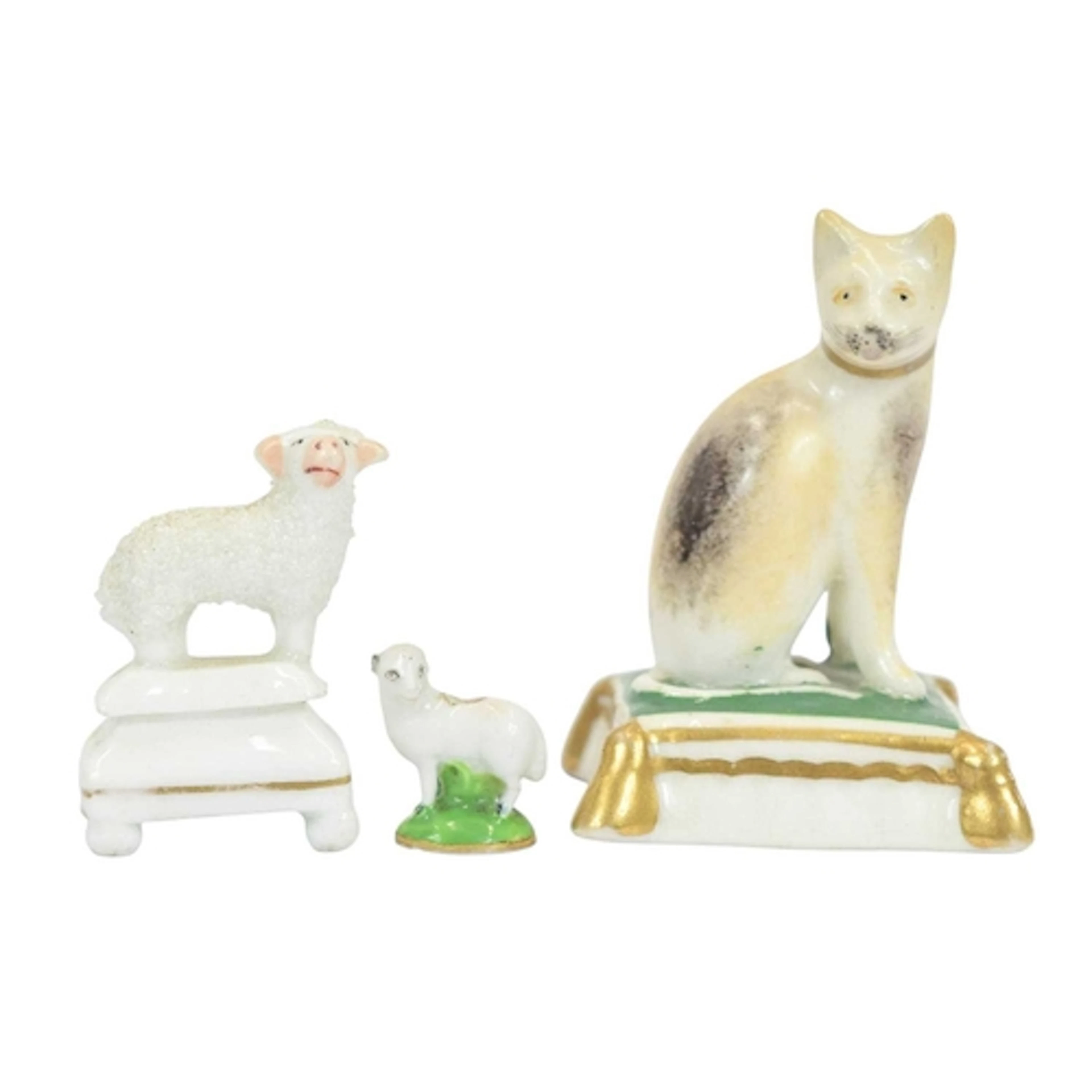 A Derby porcelain figure of a cat. Circa 1810, with ochre an...
