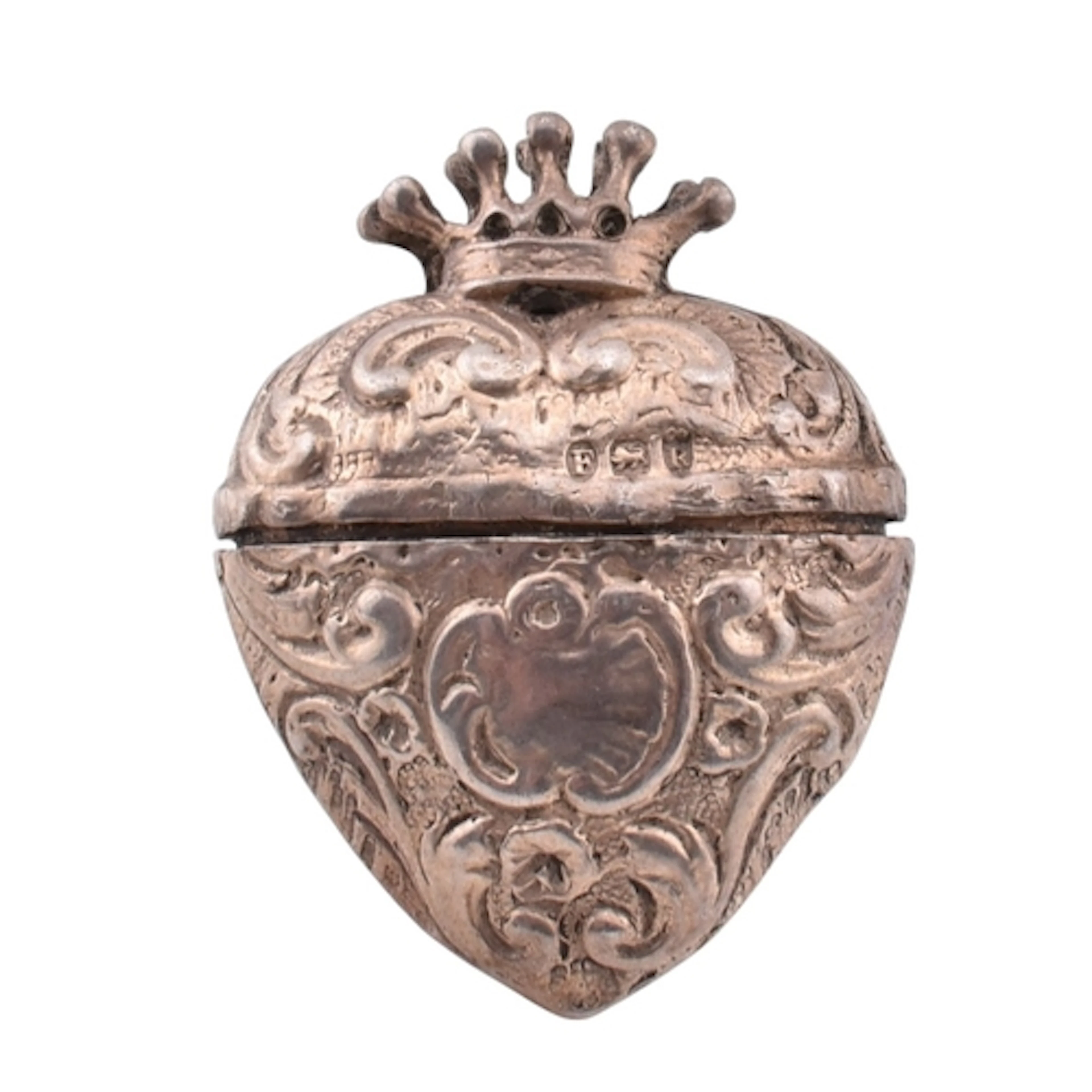 A 19th century Victorian silver heart vinaigrette pendant. T...