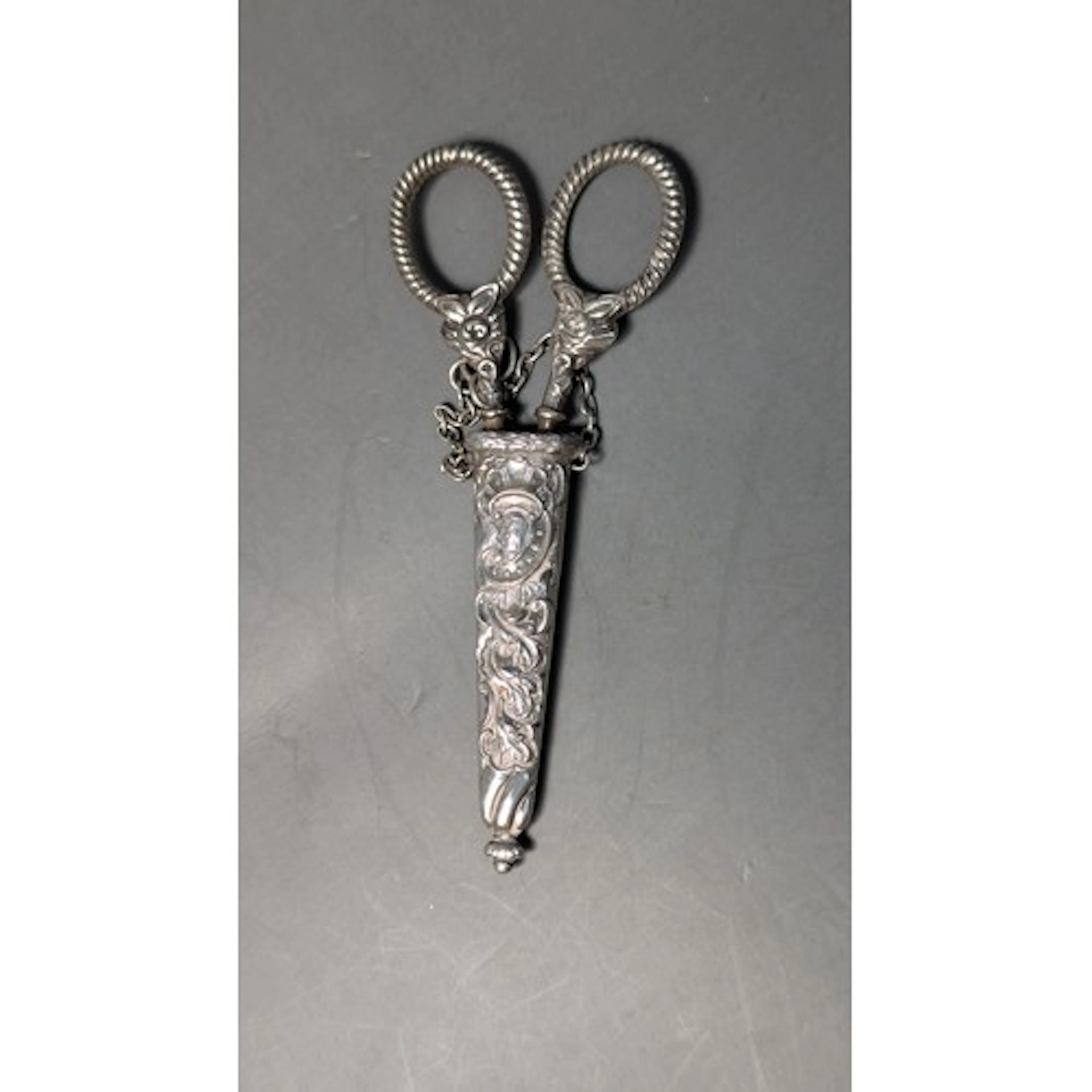 Chatelaine scissors with silver handles and sheath, sheath h...