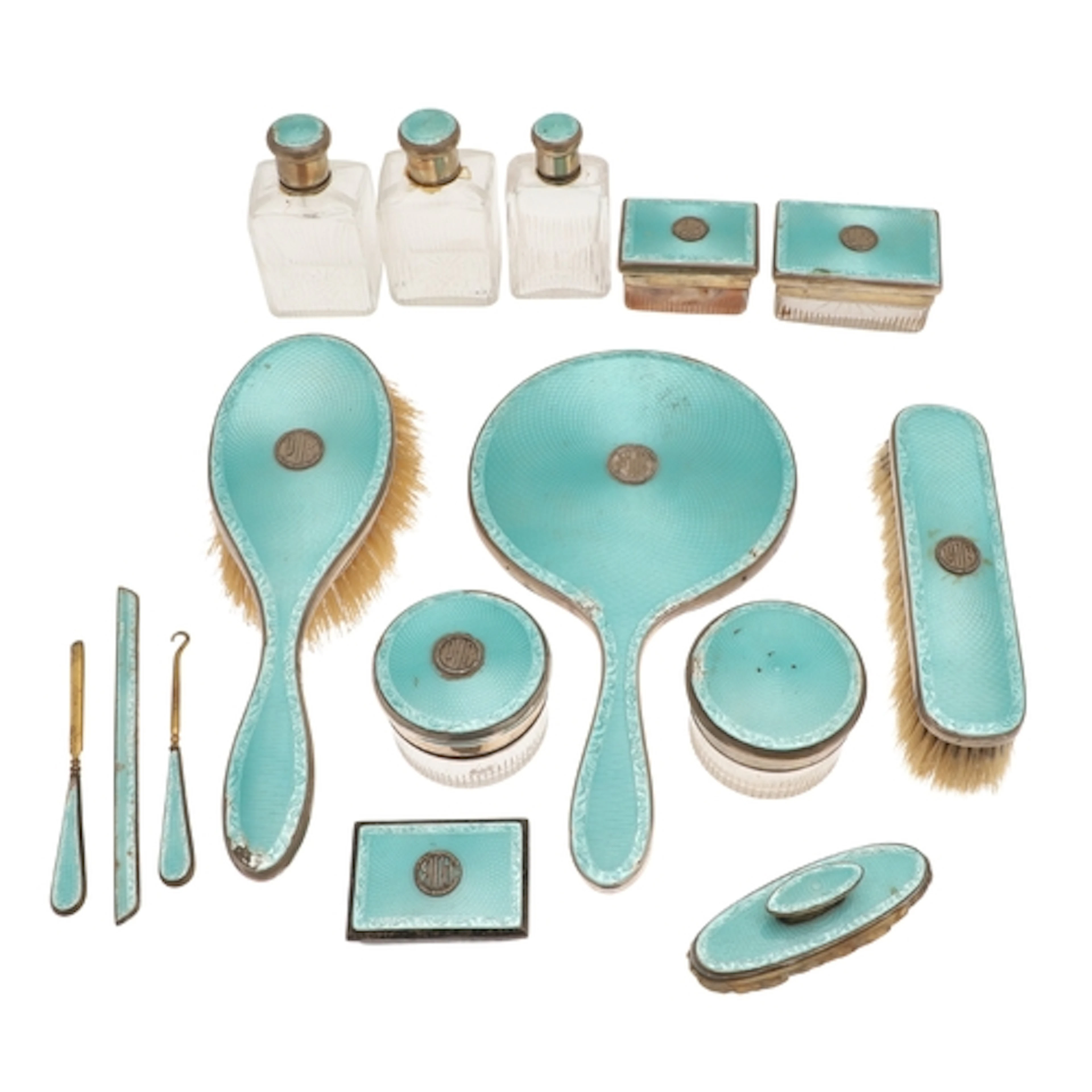A QUANTITY OF GEORGE V SILVER AND BLUE ENAMEL DRESSING TABLE...