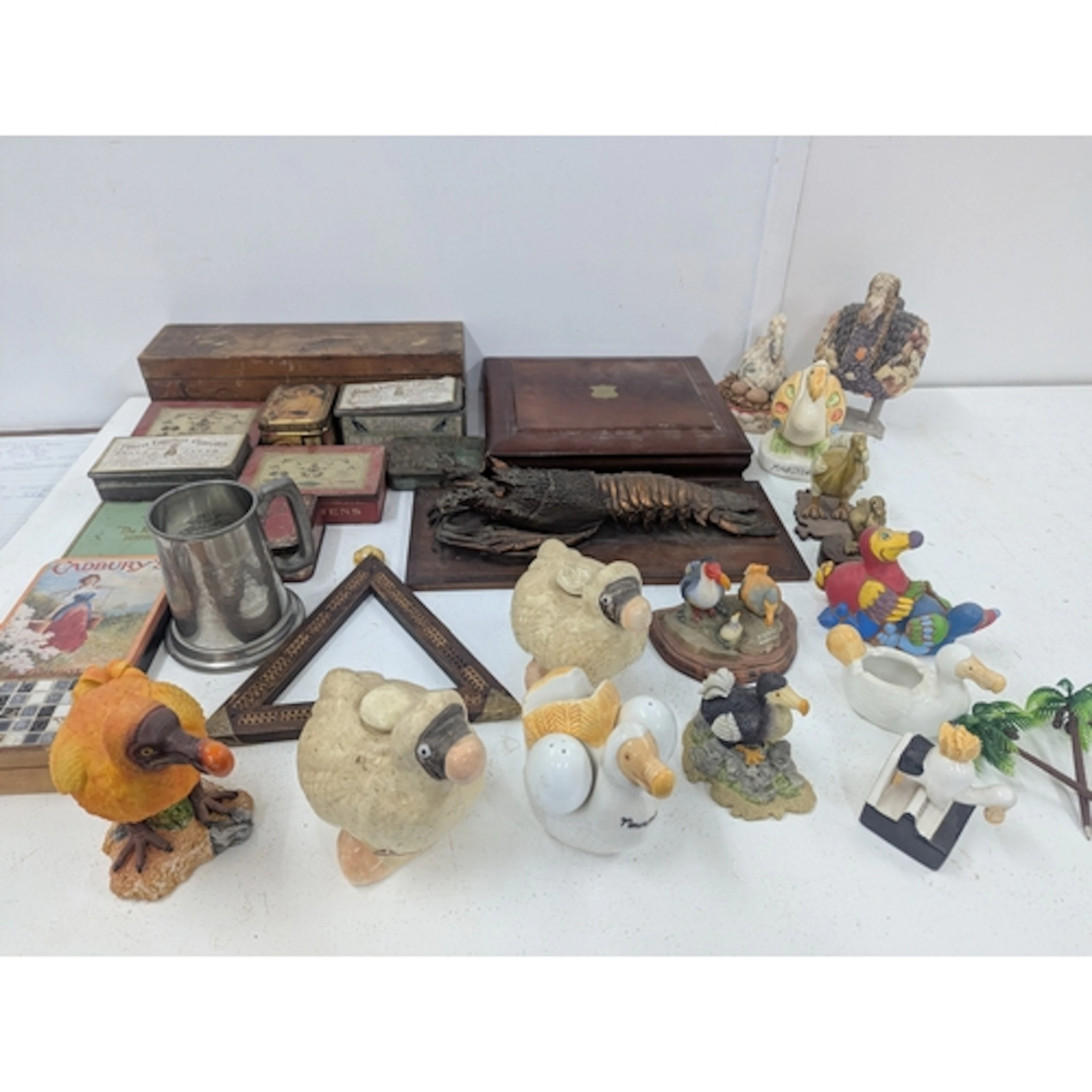 A mixed lot of collectables to include a group of ceramics D...