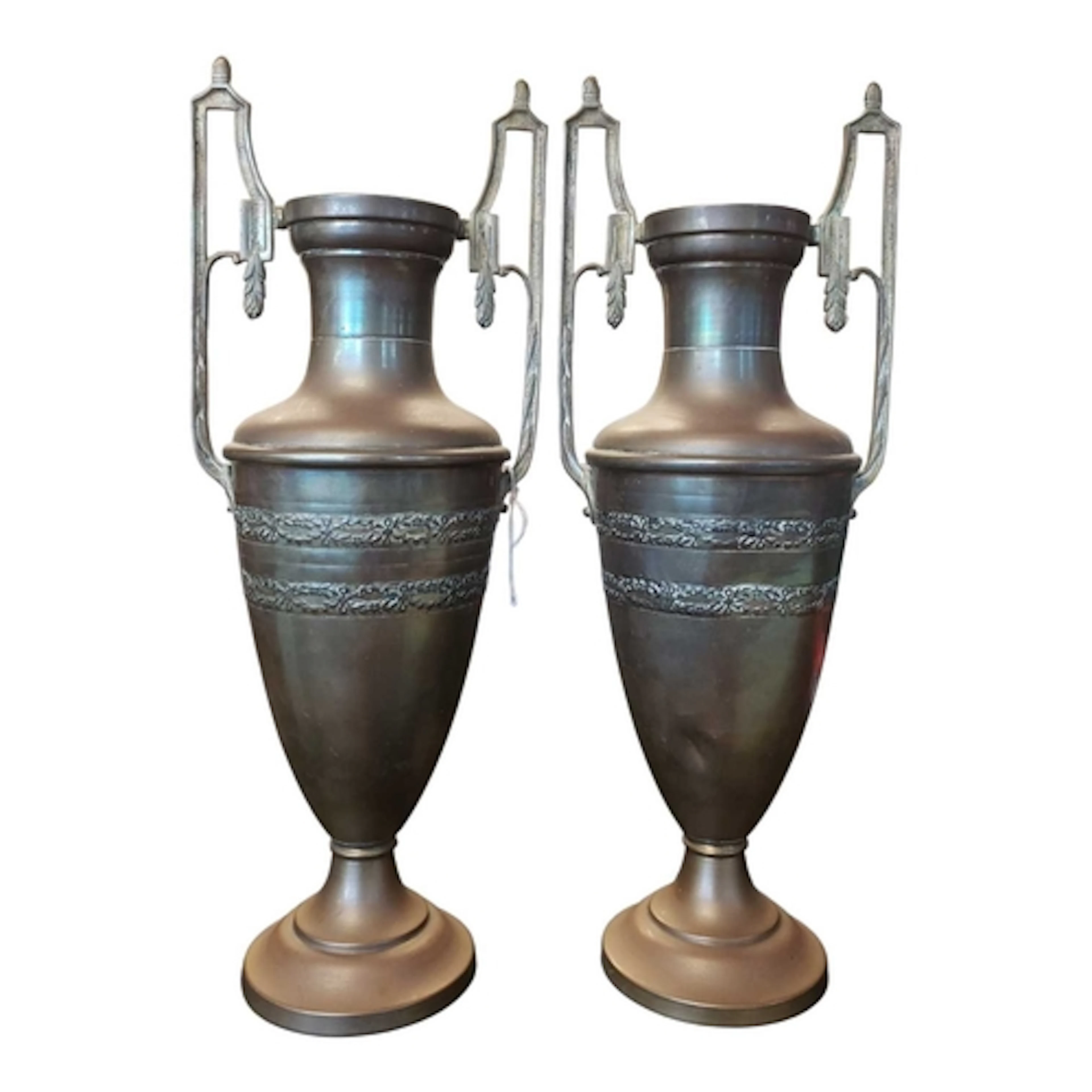 Pair of English brass 19th century urns. Both pieces decorat...