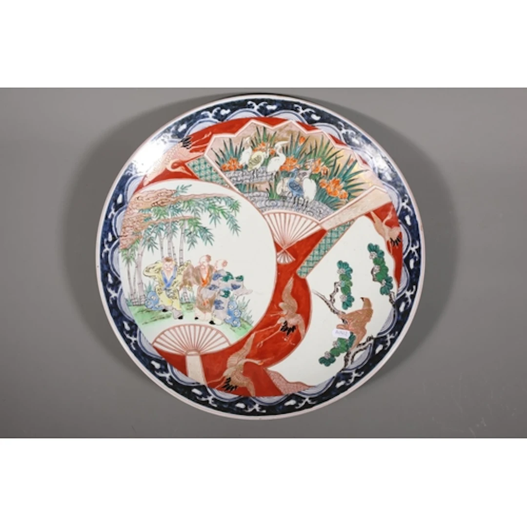 Canton charger decorated with figures, cranes and fans, furt...