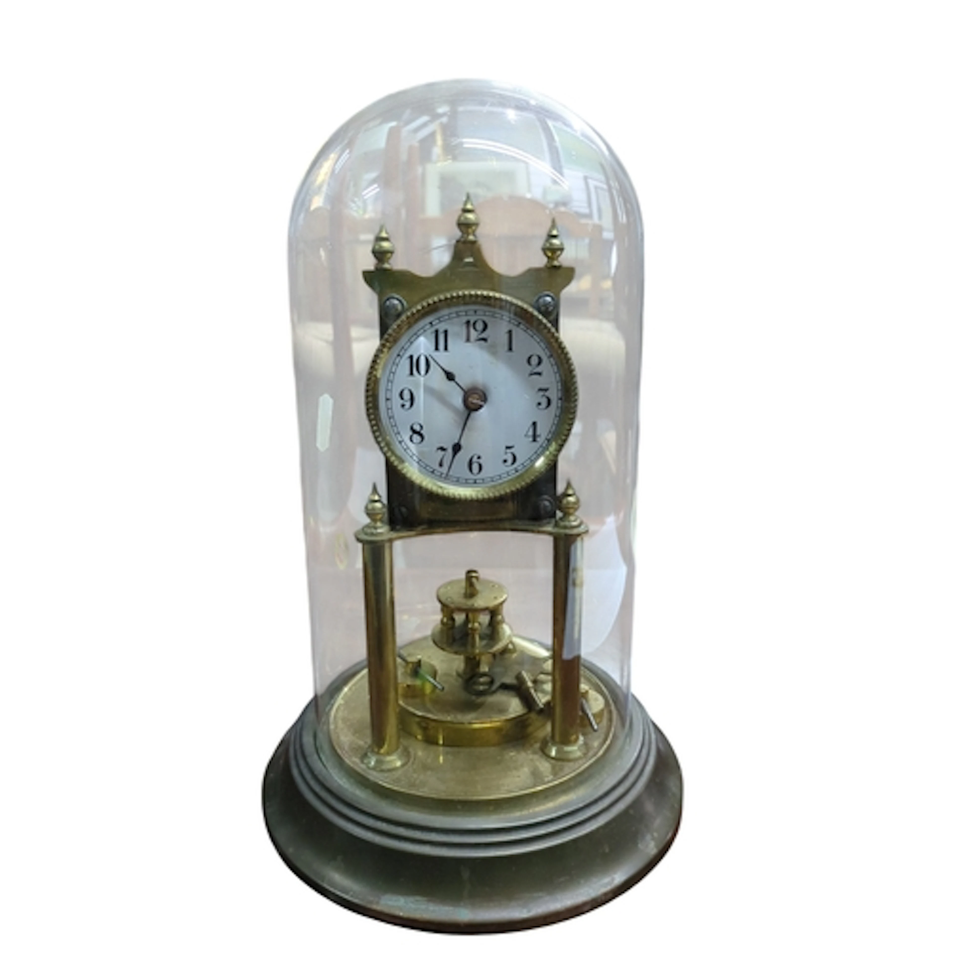 Early 20th-century brass anniversary clock with a white Arab...