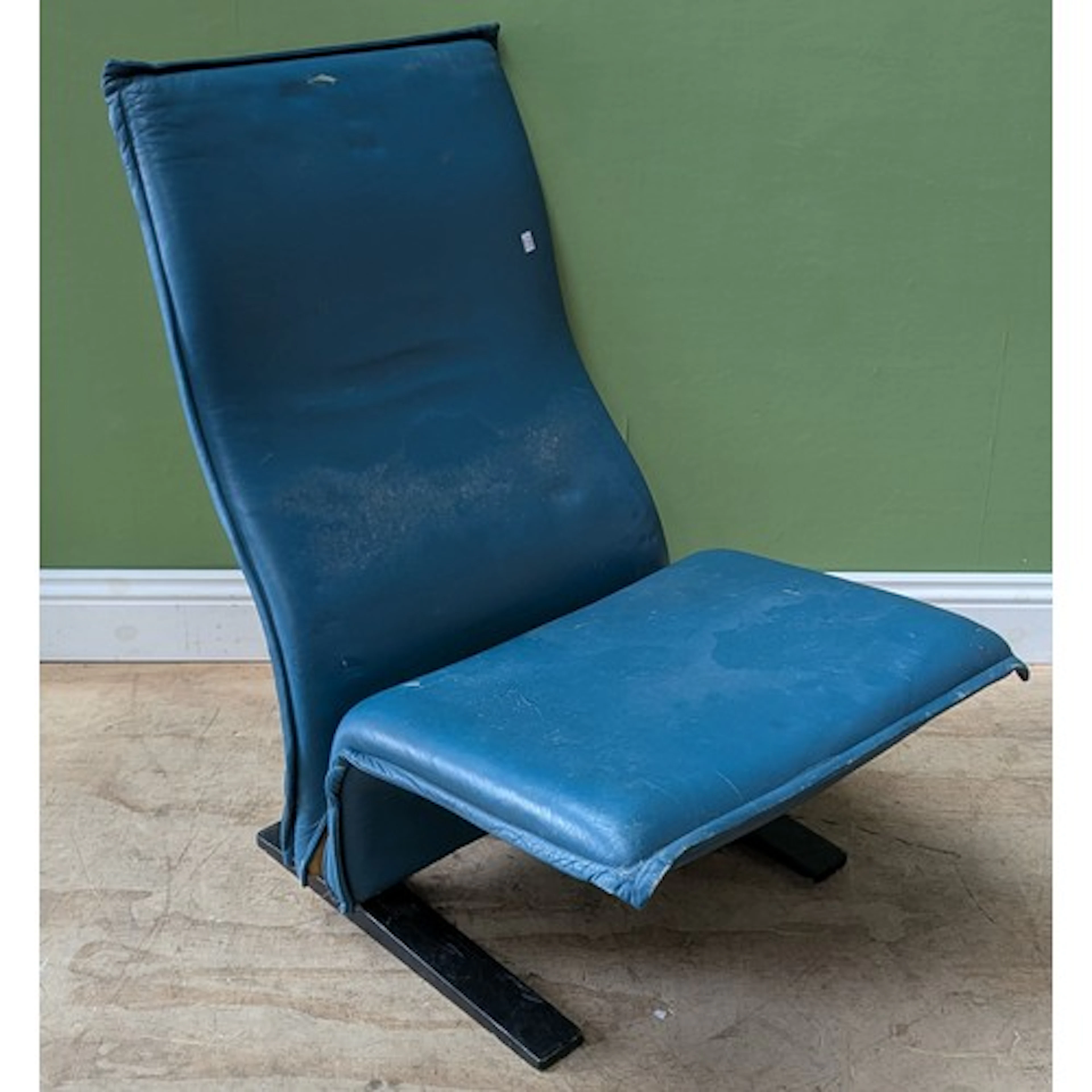 Pierre Paulin (1927-2009), a turquoise leather chair on whit...