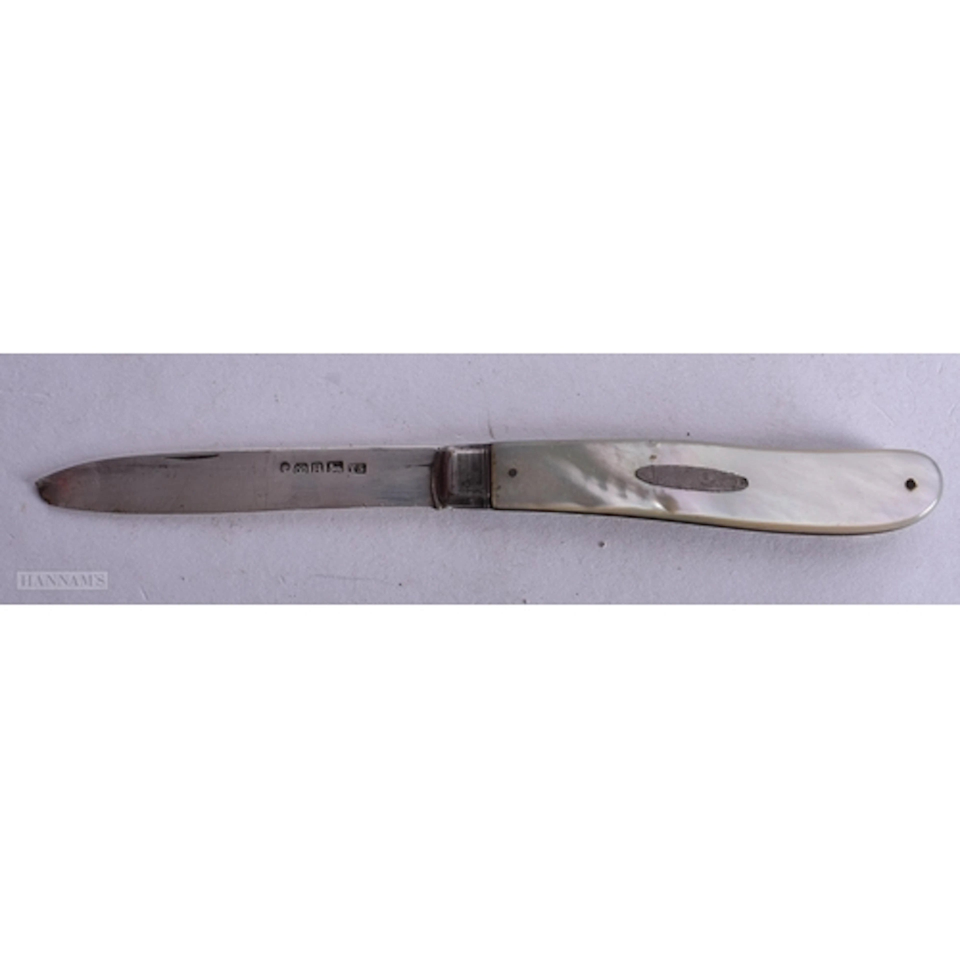 A MOTHER OF PEARL HANDLED SILVER KNIFE, HALLMARKED SHEFFIELD...