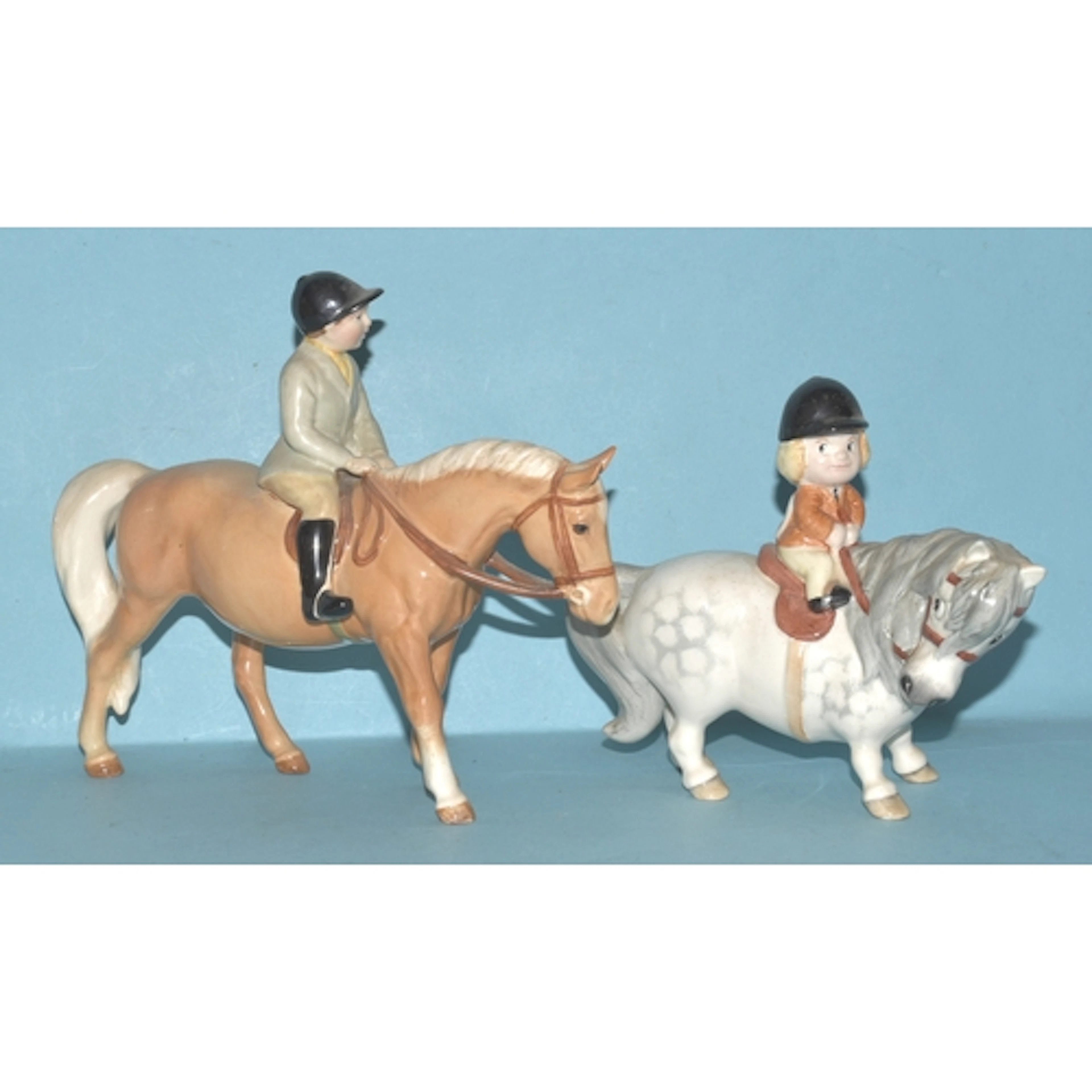 Two Beswick horse sculptures: 'Boy on Palomino pony', gloss,...
