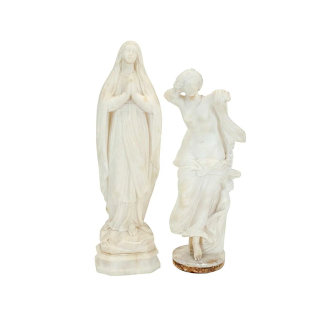 An Italian carved alabaster figure of the Virgin. Circa 1900...