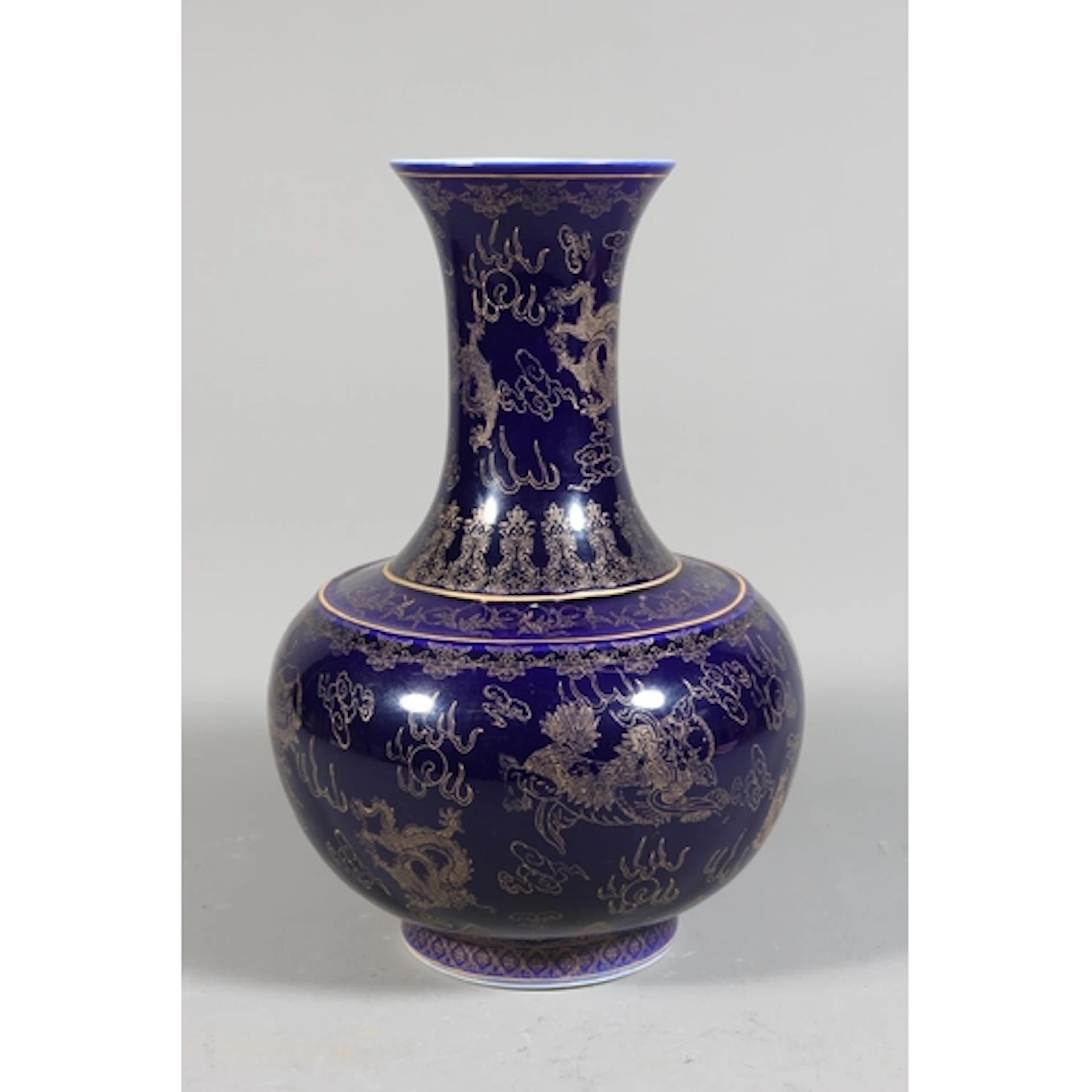 Oriental baluster vase with deep blue ground decorated with ...