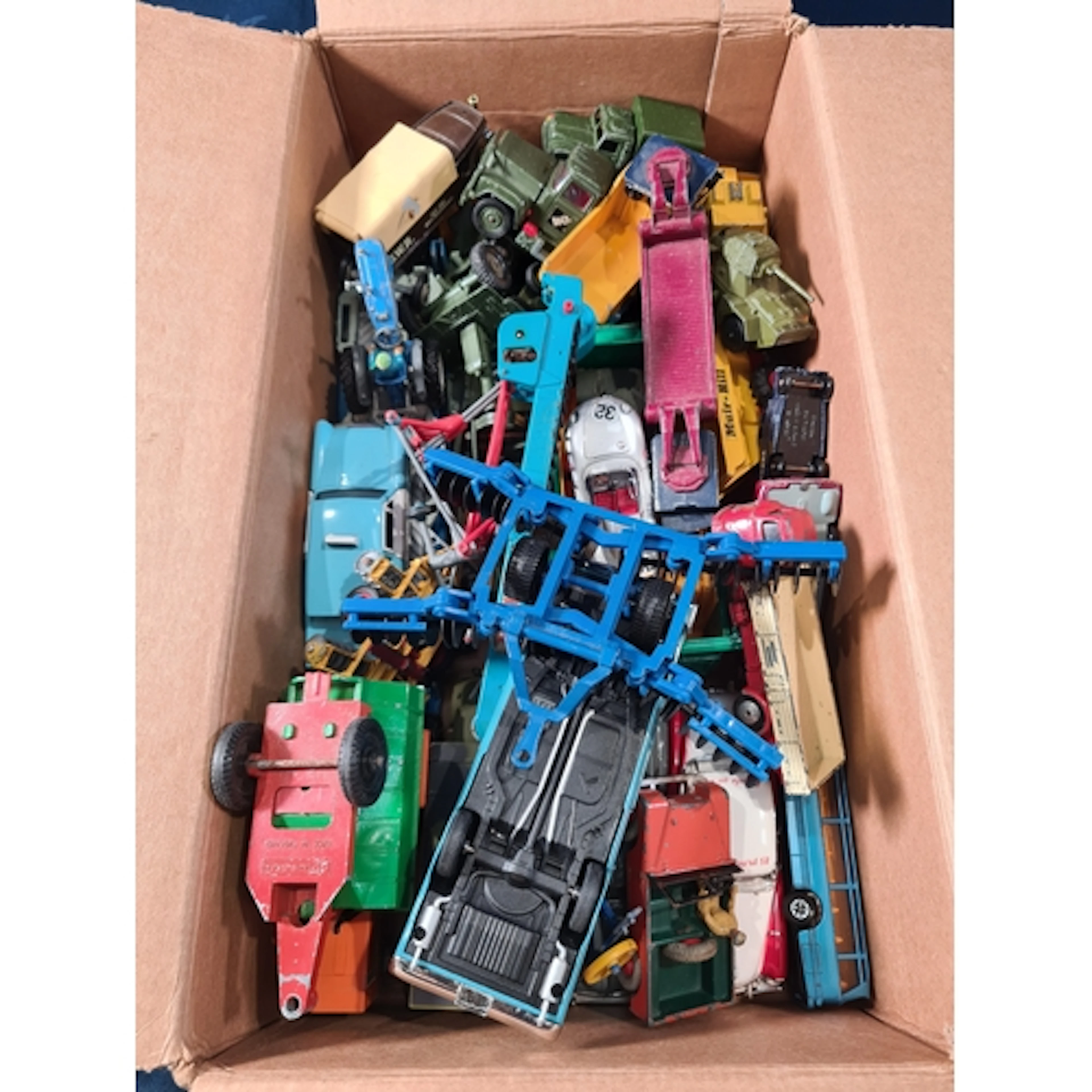 A box of unboxed play worn Diecast Models including Corgi To...