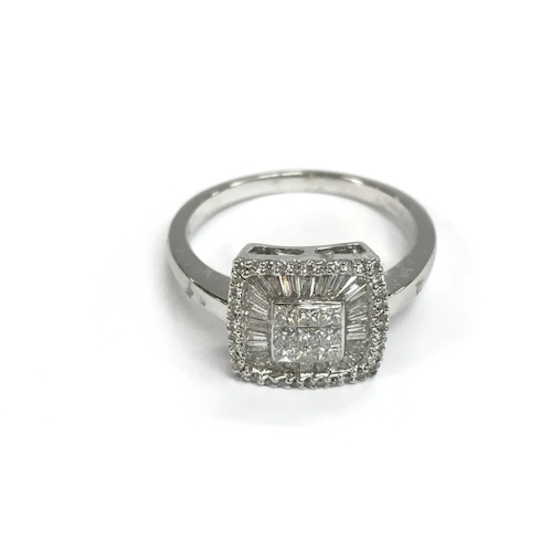 An 18ct white gold square shaped ring set with baguette and ...