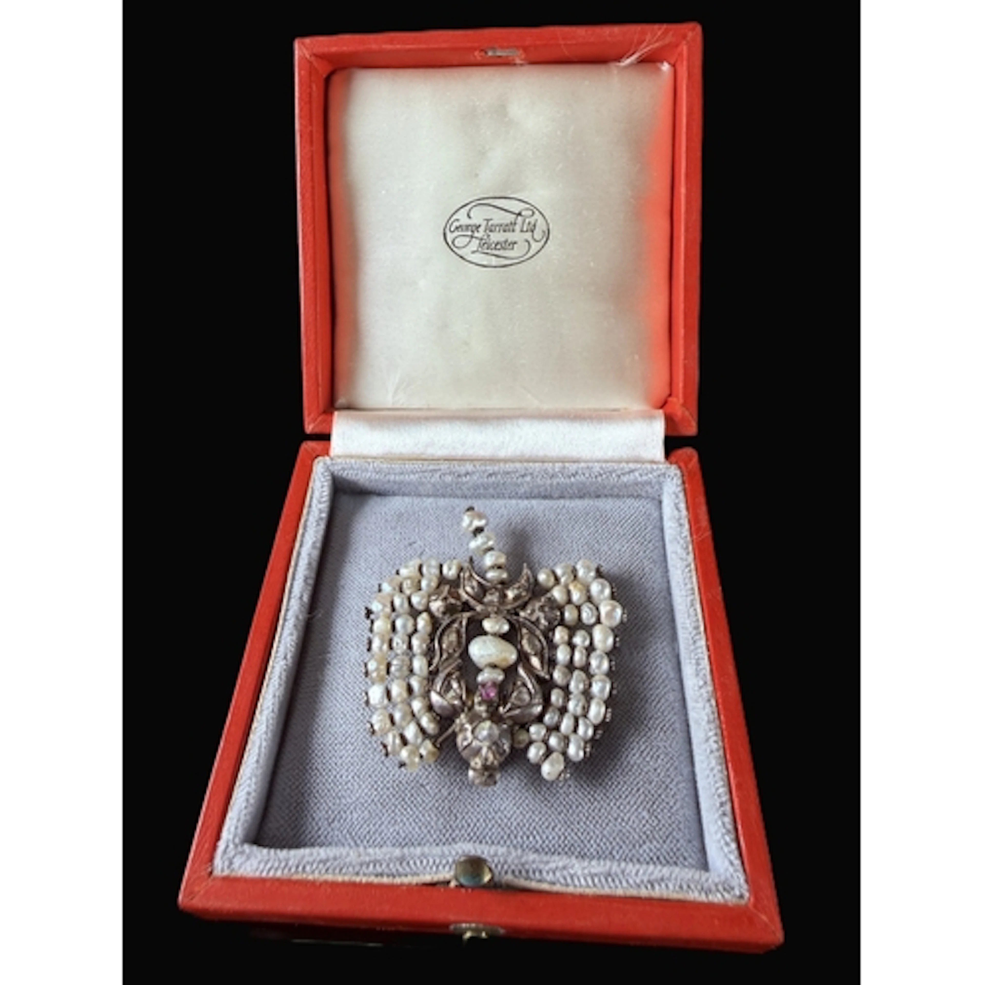 An unusual Victorian brooch set with various natural diamond...