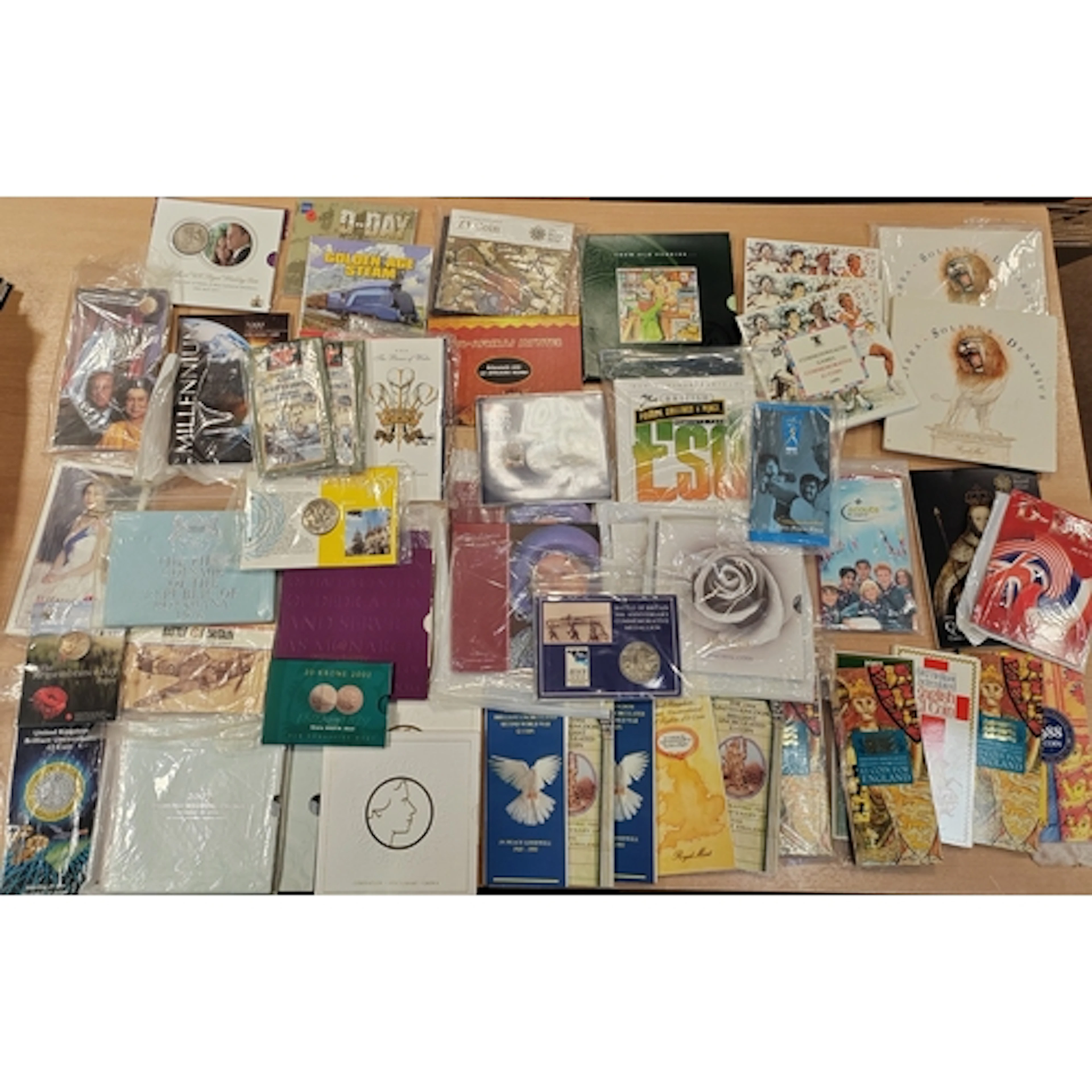 Collection of Royal Mint uncirculated coin packs (some dupli...