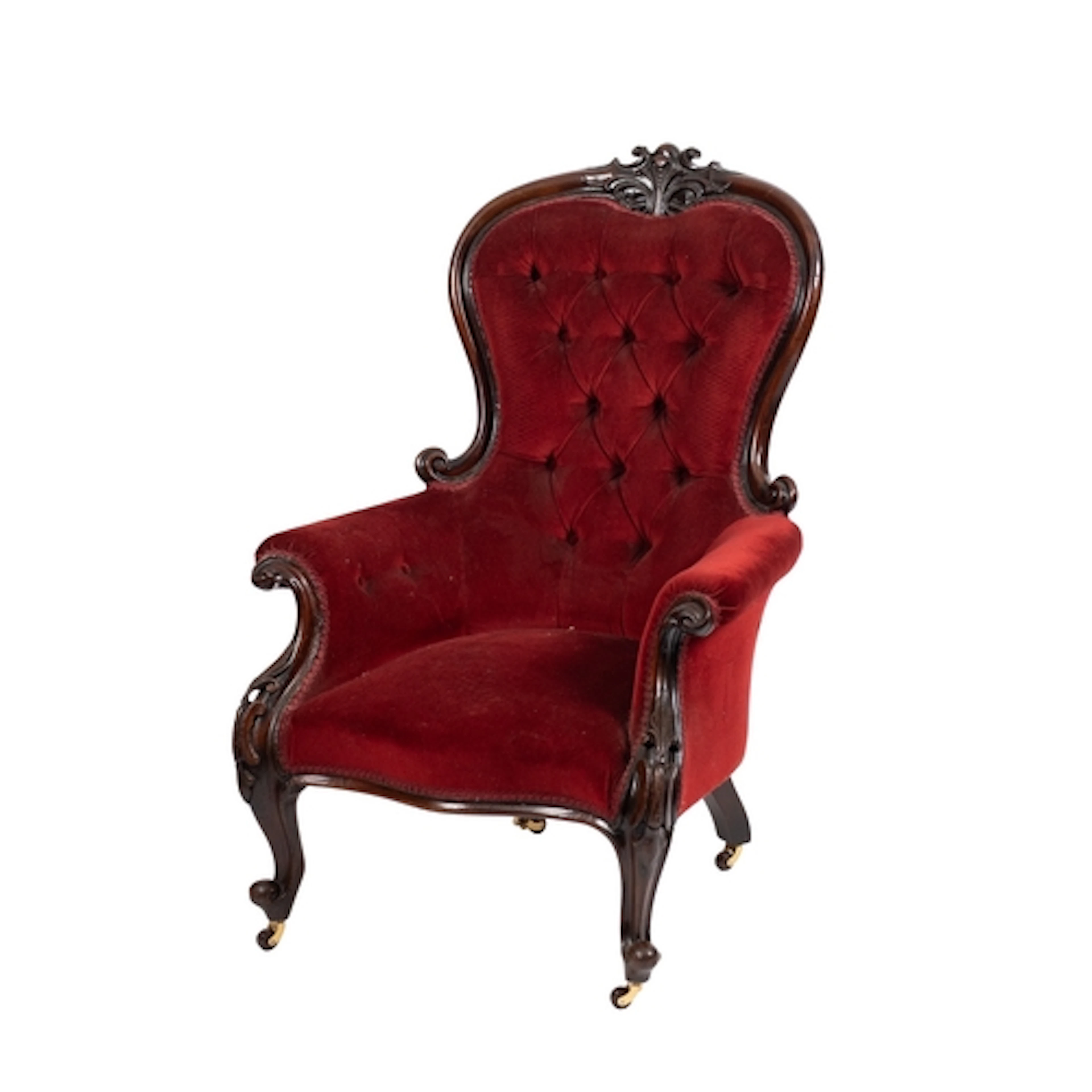 A Victorian walnut and button-upholstered armchair. circa 18...