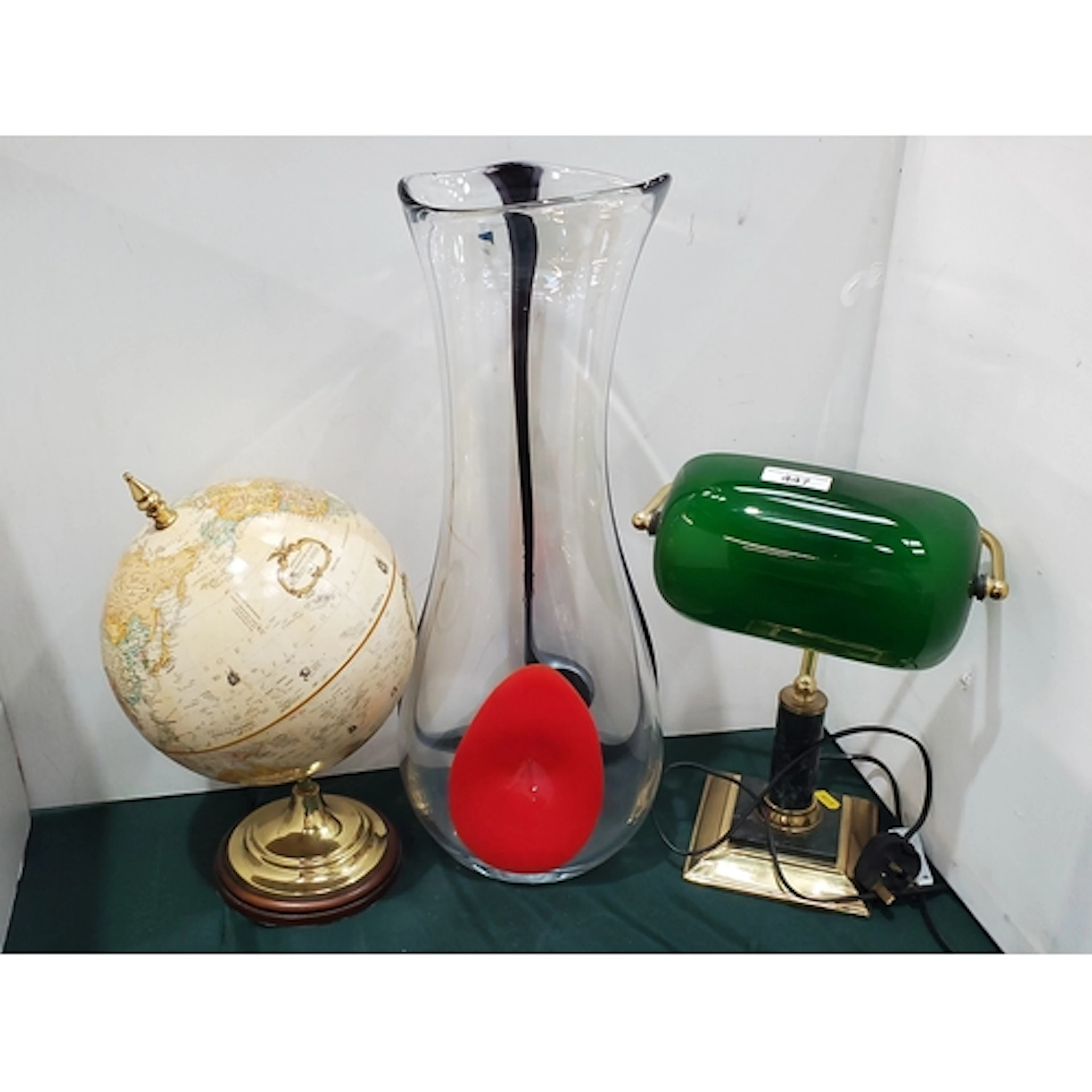 A brass Desk Lamp, a World Classic Series Globe, an Art Glas...
