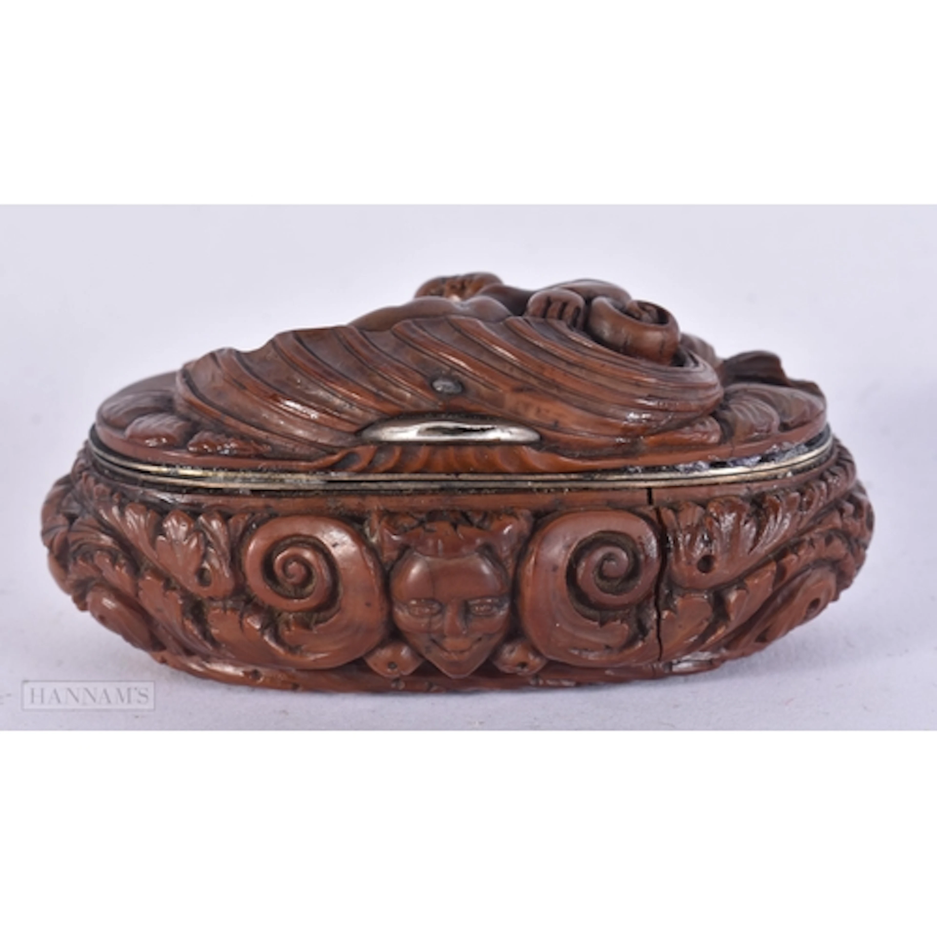 A FINE EARLY 18TH CENTURY FRENCH COQUILLA NUT SNUFF BOX carv...